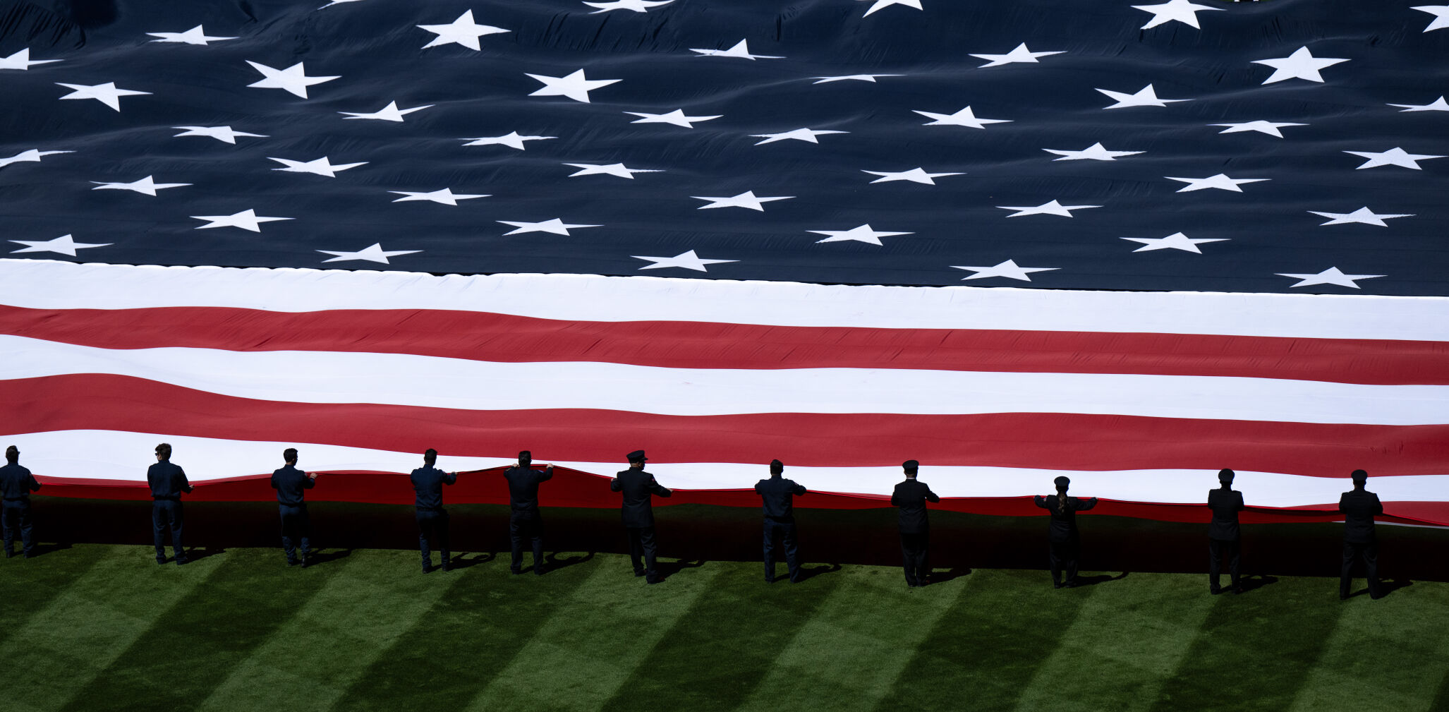 The National Anthem kicks off the Colorado Rockies opening day at Coors Field, Friday, April 5, 2024, in Denver, Colo. (Parker Seibold, The Gazette) (Parker Seibold)