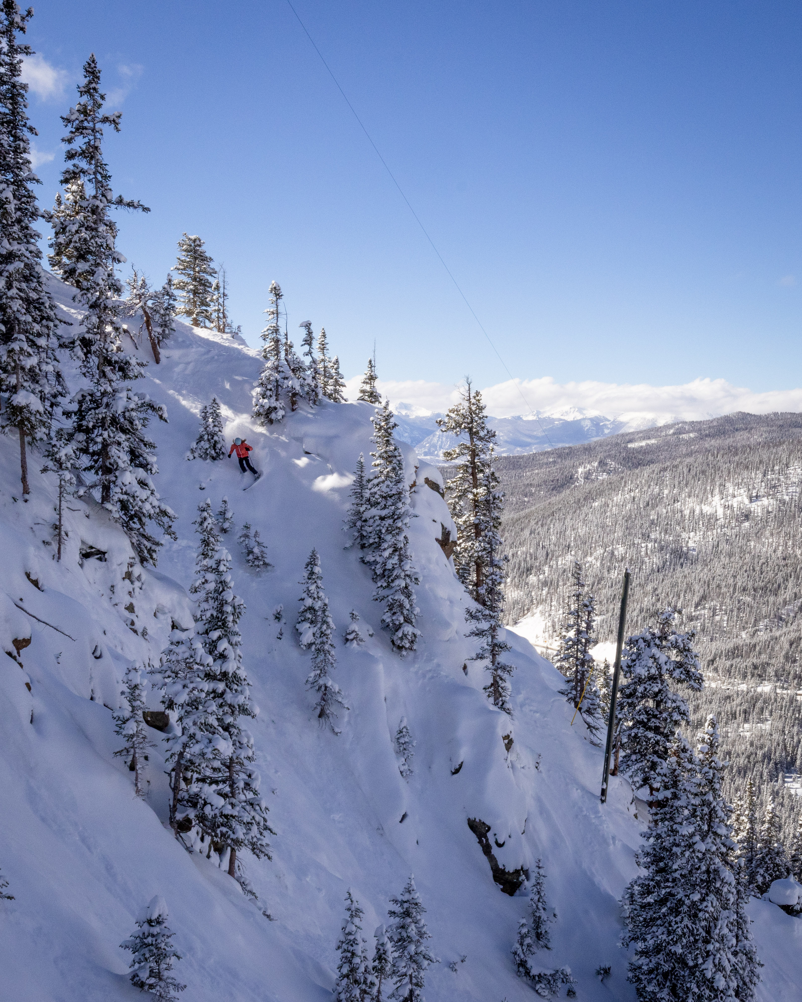 Valerie Arcara skis one of the gullies in the Steep Gullies zone shortly after terrain was open for the 2023-24 skiing and riding season, as seen at Arapahoe Basin Ski Area near Dillon, Colorado. (Lucas Herbert, Arapahoe Basin Ski Area)