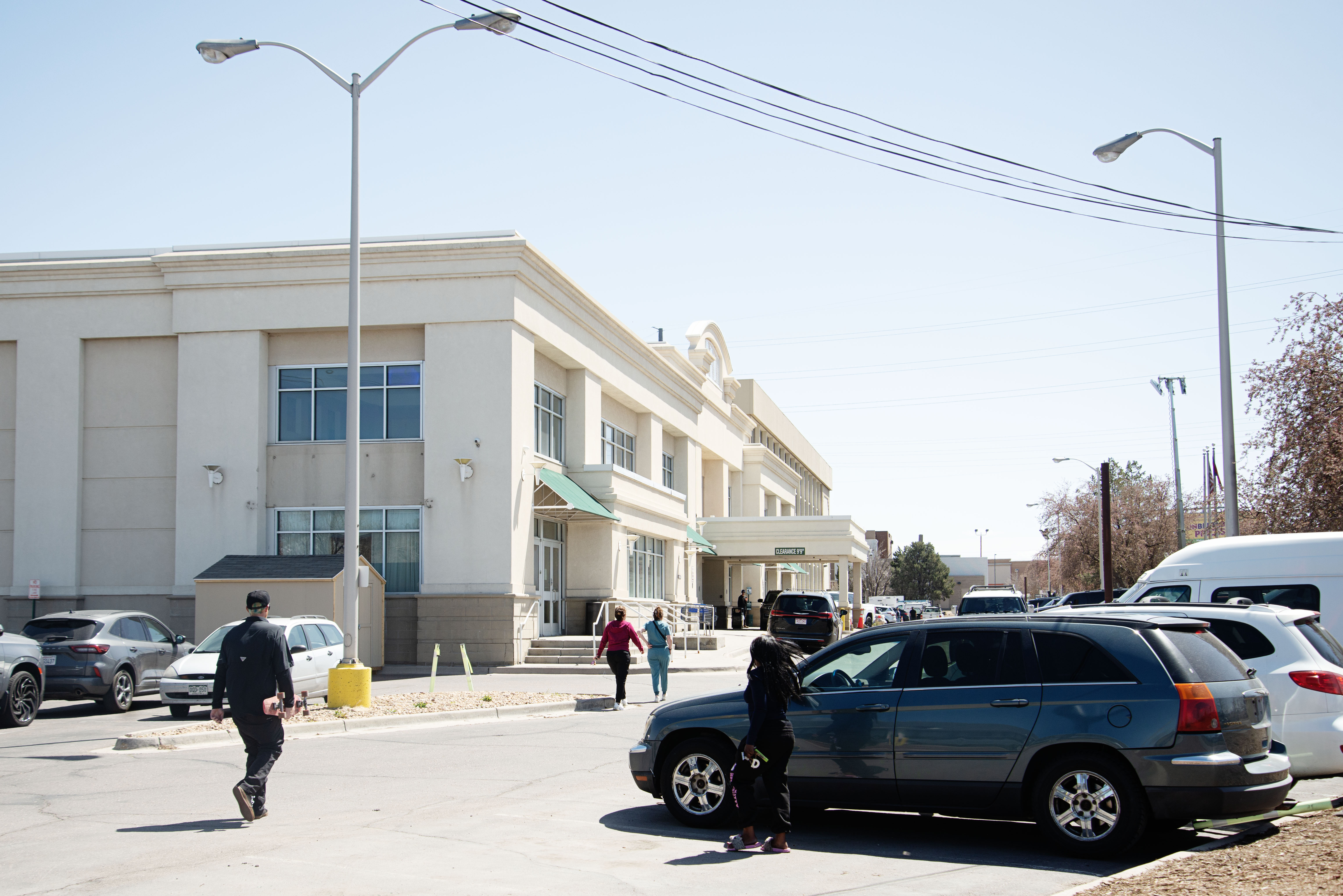 Residents and staff walk into the shelter in the former DoubleTree hotel in Denver's Central Park neighborhood on Thursday, April 11, 2024. (TomHellauerMultimedia Producertom.hellauer@denvergazette.comhttps://denvergazette.com/content/tncms/avatars/f/9e/622/f9e6228a-3b6b-11ed-bf10-fbb71fa8e421.f54b911252c540f1d61709edc4727a39.png)