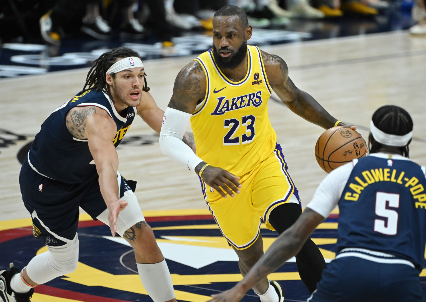 Aaron Gordon defends Lakers’ LeBron James during game 5 of the first round of the Western Conference championships at Ball Arena on Monday, April 24, 2024. The Nuggets won the game 108-106. (Photo by Jerilee Bennett, The Gazette)