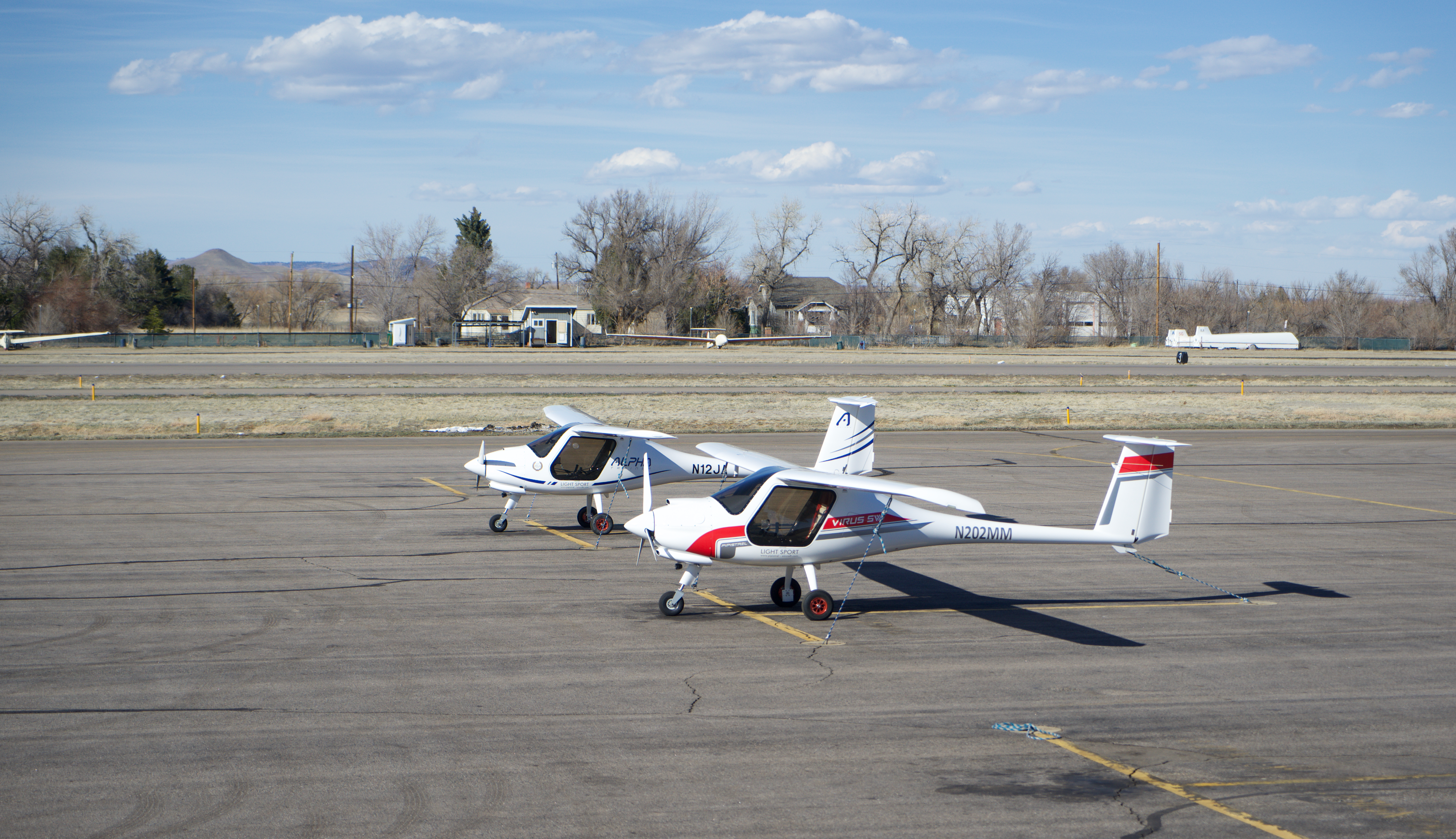 A pair of brand new training aircraft sit on the ramp at the Boulder Municipal Airport. These new trainers are quieter than the typical general aviation airplane and are capable of burning unleaded fuel, a potential sign of changes to come. These two aircraft are owned by Journeys Aviation, one of the airport's flight schools. Flight schools like Journeys Aviation are a crucial step for future pilots, its owner said, as they can get flight hours and move on to regional and then national airlines, which will does much to address a looming pilot shortage. (Alex Edwards/The Denver Gazette) (AlexanderEdwardsBusiness Reporteralex.edwards@gazette.comhttps://secure.gravatar.com/avatar/dbaa50cc8a9183e280c297e3afa72ace?d=mm&r=g)