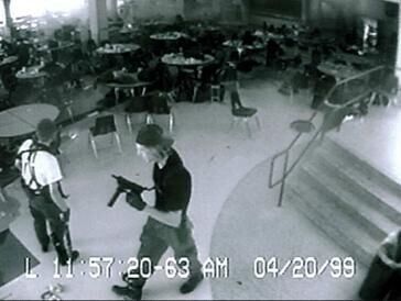 Eric Harris, left, and Dylan Klebold are shown during their attack on Columbine High School in a black-and-white still image taken from the security video on April 20, 1999. (JoeyBunchjoey.bunch@coloradopolitics.comhttps://secure.gravatar.com/avatar/66505e98f9e3fed10e6a3b9a1fc4ca22?d=mm&r=g)