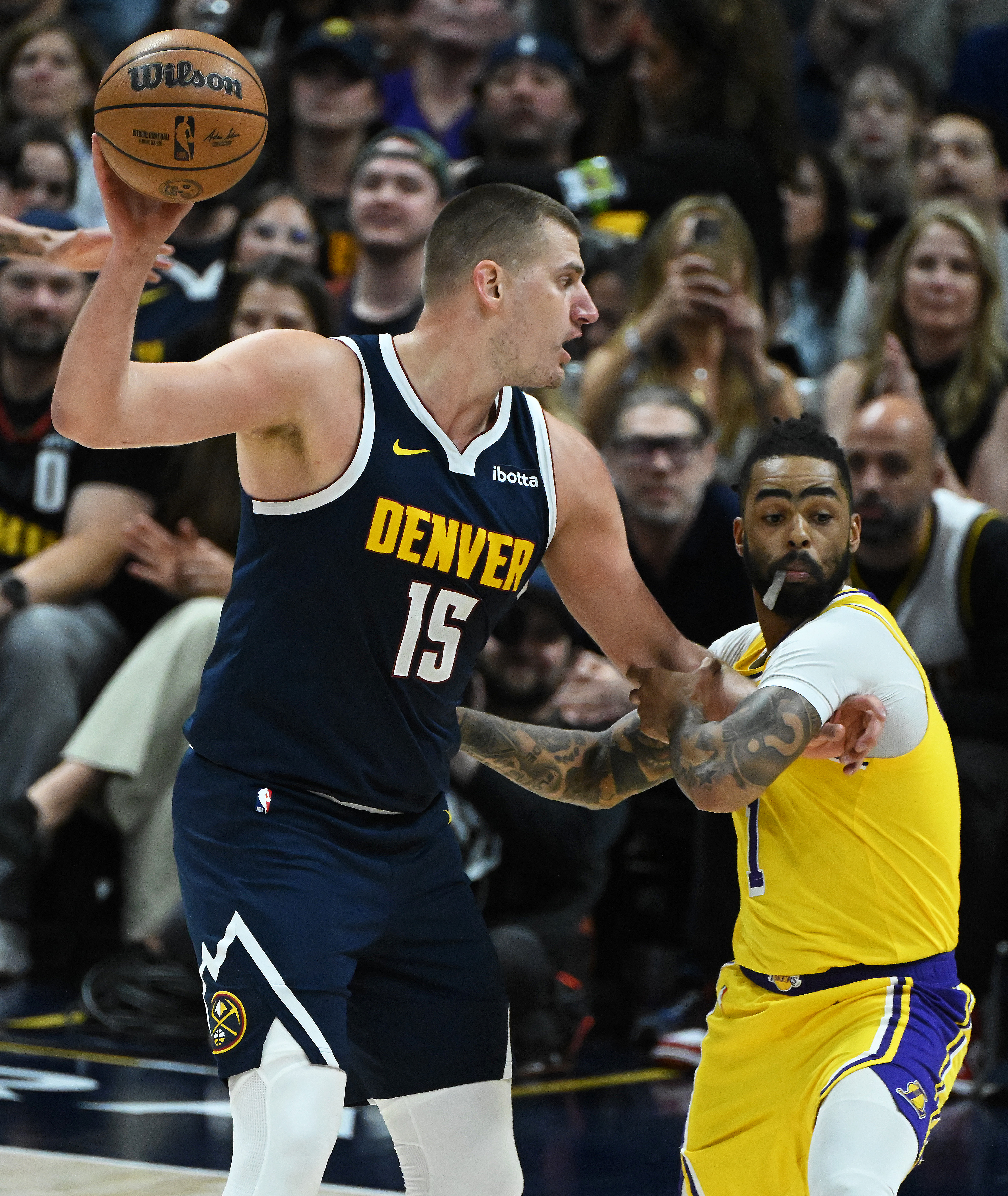 Nikola Jokic looks to pass the ball during game 5 of the first round of the Western Conference championships at Ball Arena on Monday, April 24, 2024. The Nuggets won the game 108-106. (Photo by Jerilee Bennett, The Gazette)
