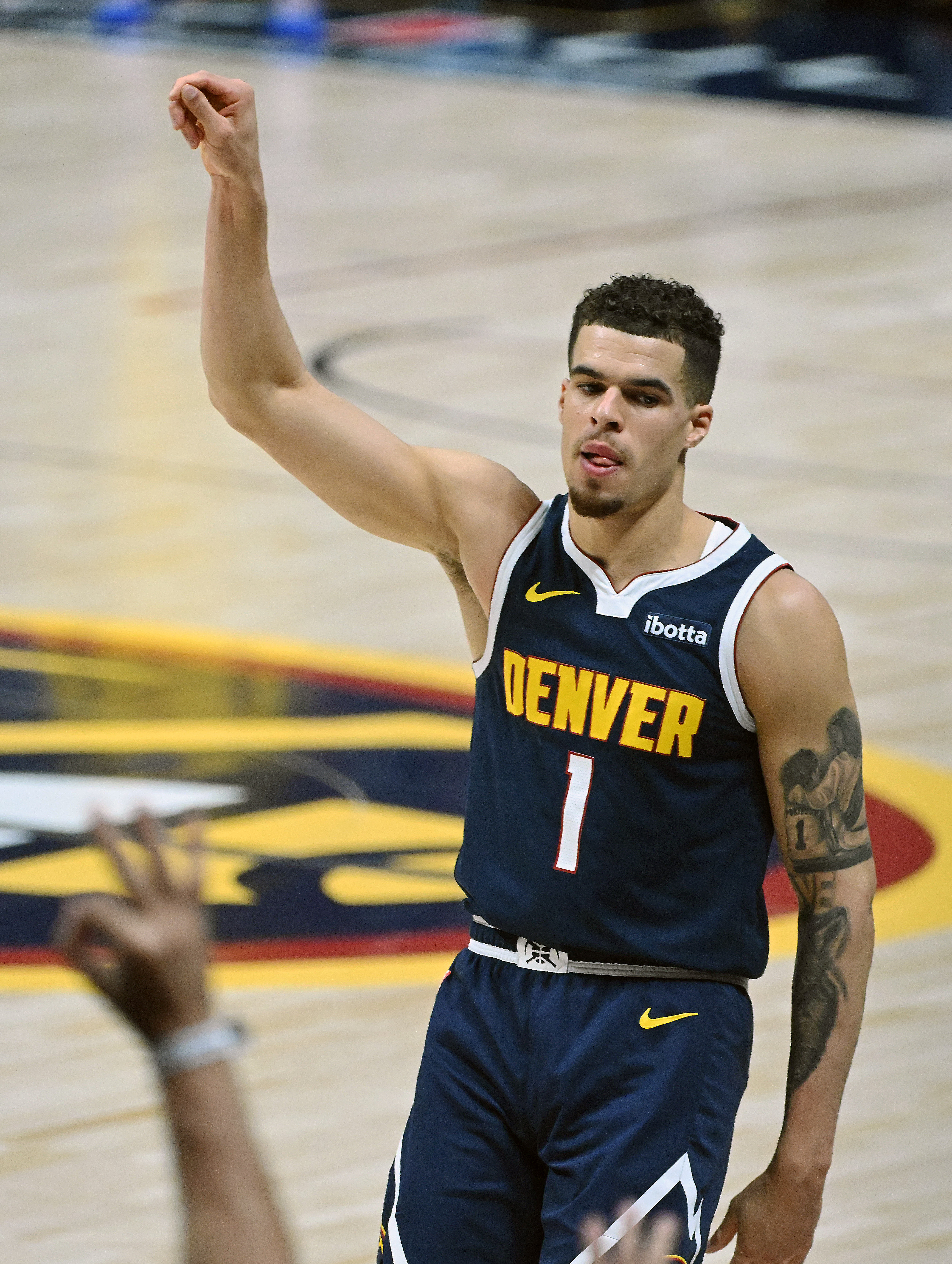 Michael Porter, Jr. celebrates a three pointer during game 5 of the first round of the Western Conference championships at Ball Arena on Monday, April 24, 2024. The Nuggets won the game 108-106. (Photo by Jerilee Bennett, The Gazette)