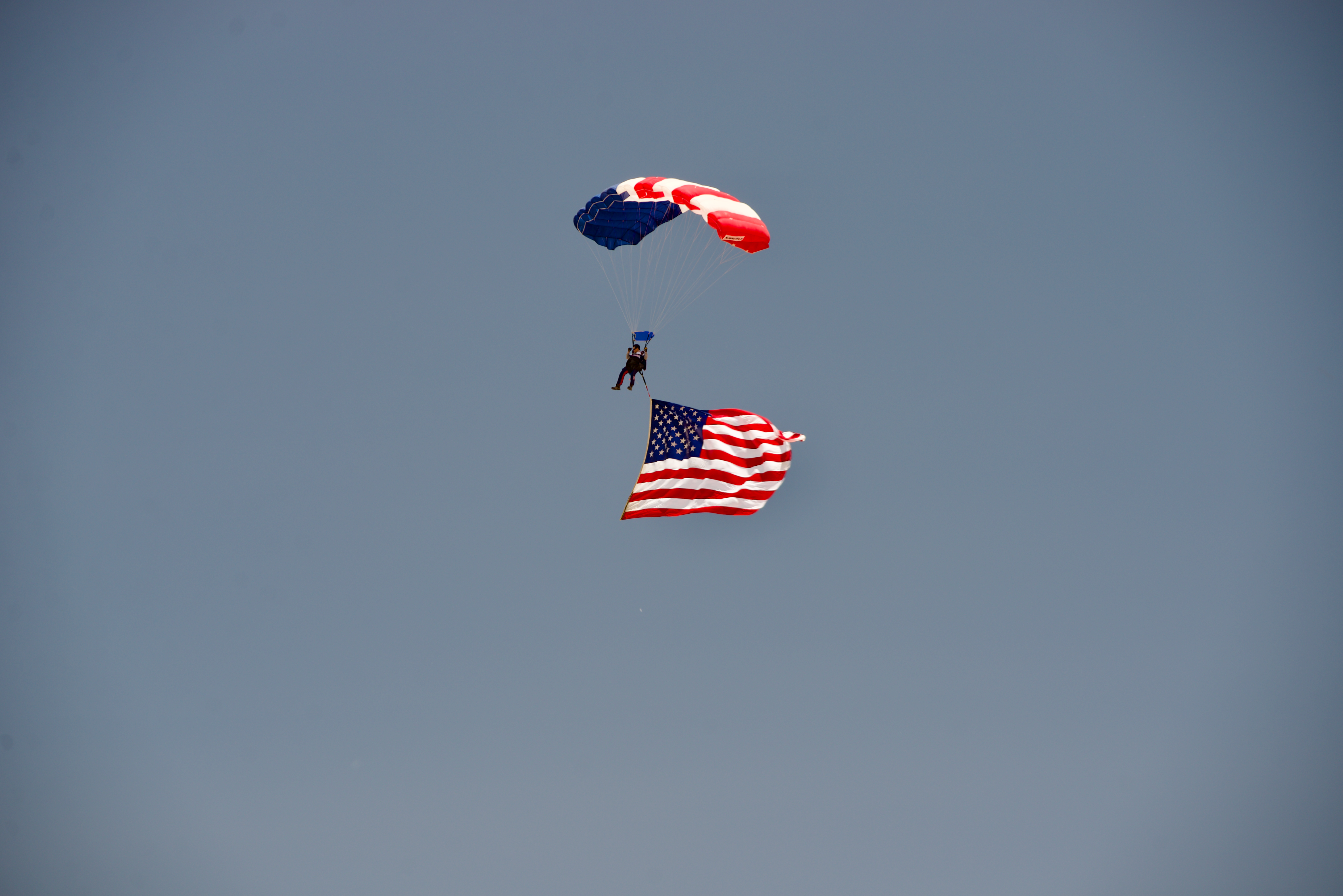 As part of Memorial Day celebrations in Boulder on May 27, 2024, a parachutist carrying the American Flag leapt from an airplane and landed in Folsom Field as part of the 44th BOLDERBoulder. All six branches of the United States military, Air Force, Army, Navy, Marine Corps, Coast Guard and Space Force, were represented. (Alex Edwards/The Denver Gazette) (AlexanderEdwardsBusiness Reporteralex.edwards@gazette.comhttps://secure.gravatar.com/avatar/dbaa50cc8a9183e280c297e3afa72ace?d=mm&r=g)
