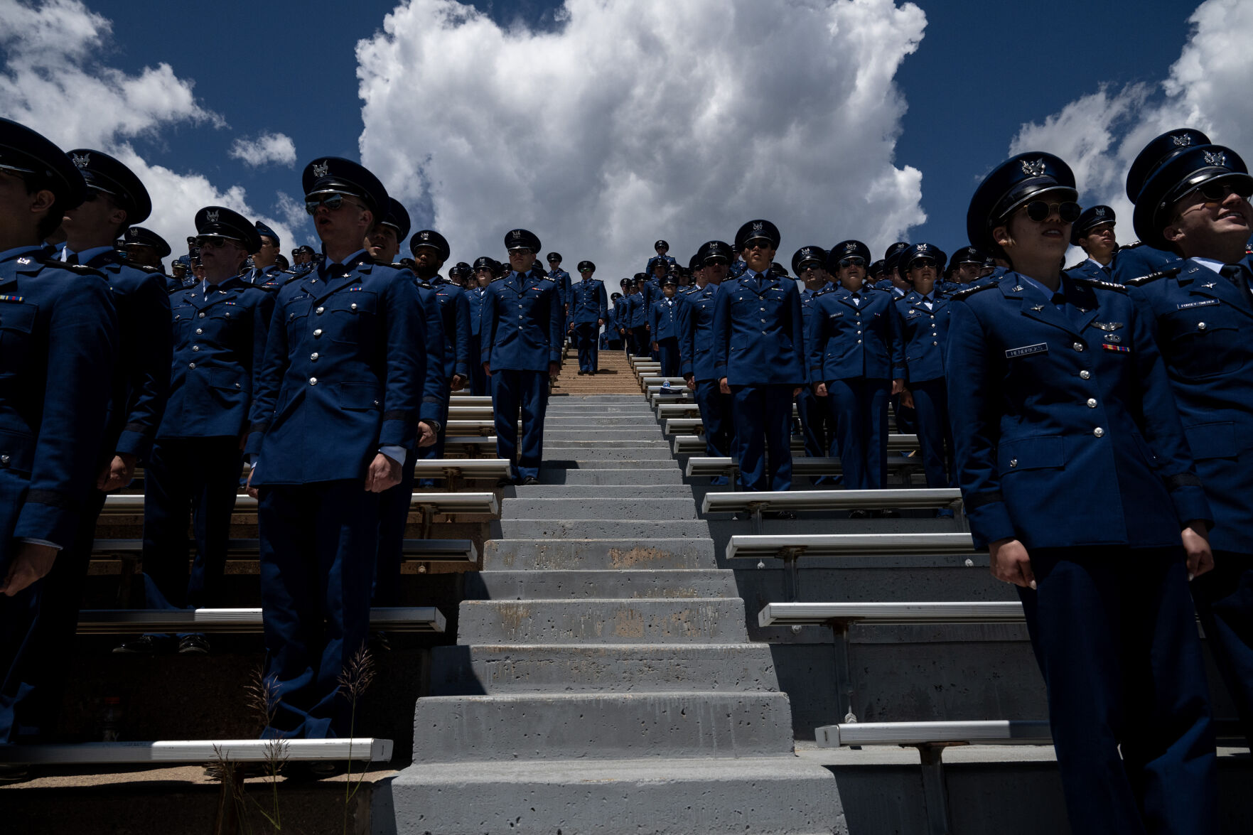 Air Force Academy cadets stand for the Air Force and Space Force songs during the Air Force Academy graduation at Falcon Stadium on Thursday, May 30, 2024, in Colorado Springs, Colo. (Parker Seibold, The Gazette) (Parker Seibold)