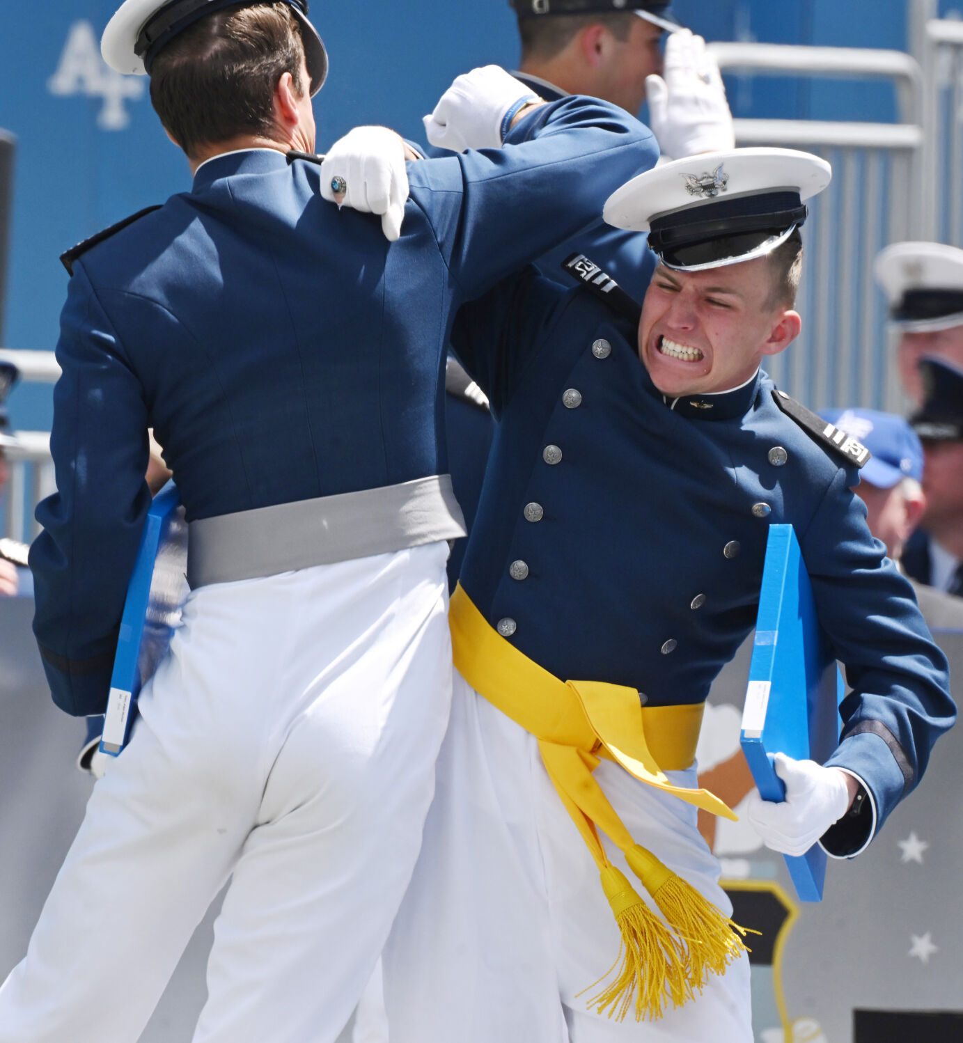 Graduating cadets celebrate after receiving their diplomas during the Graduation Ceremony at Falcon Stadium at the Air Force Academy on Thursday, May 30, 2024. (Photo by Jerilee Bennett, The Gazette)