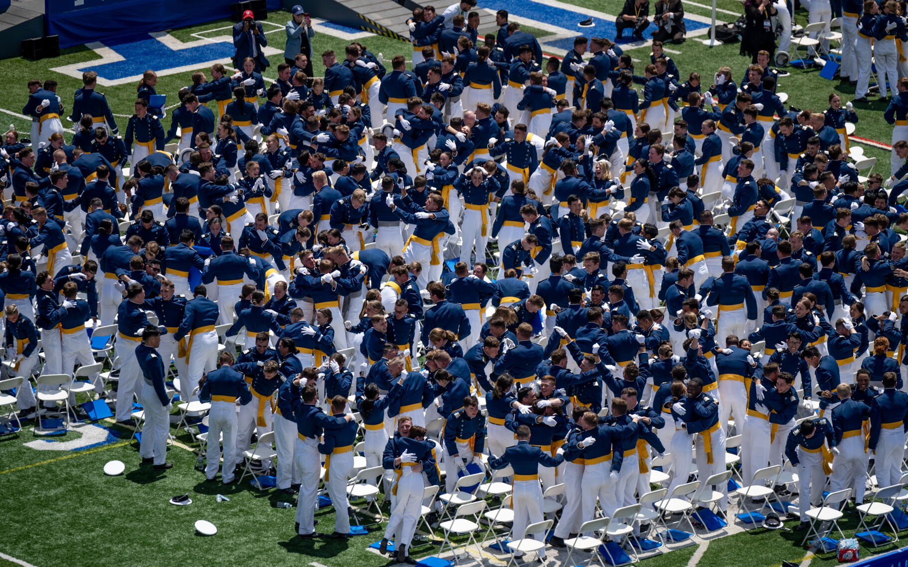 Air Force Academy graduates celebrate with one another following the gradation ceremony at Falcon Stadium where 974 cadets became officers on Thursday, May 30, 2024, in Colorado Springs, Colo. (Parker Seibold, The Gazette) (Parker Seibold)