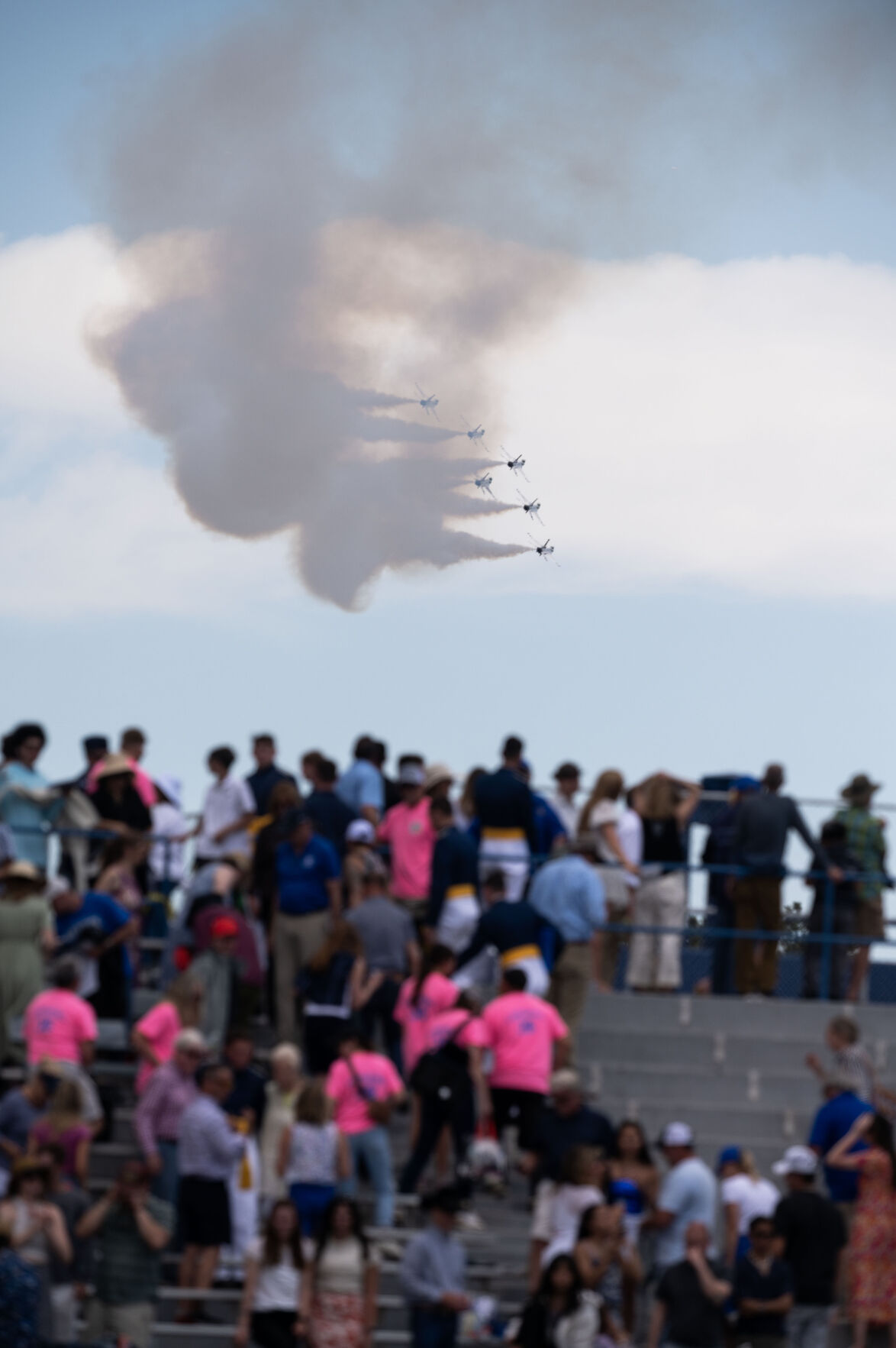 Audience members watch the Thunderbirds as they fly past Falcon Stadium during the Air Force Academy Graduation on Thursday, May 30, 2024. (Stephen Swofford, The Gazette) (Stephen Swofford The Gazette)