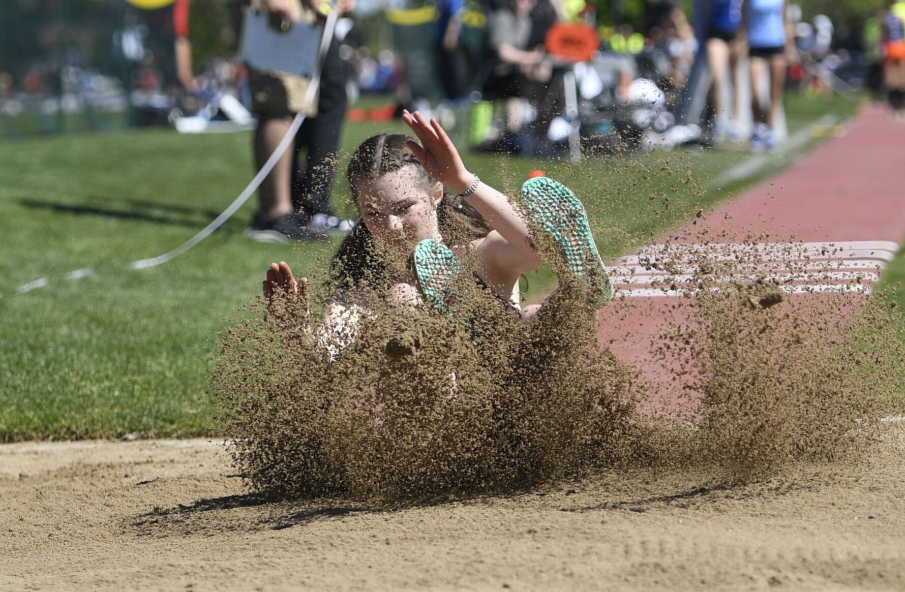 Cheyenne Mountain’s Sumner Davis competes in the 4A girls’ triple jump Thursday at the state track and field championships. She placed third. (Brent Briggeman, The Gazette) (BRENT BRIGGEMAN, THE GAZETTE)