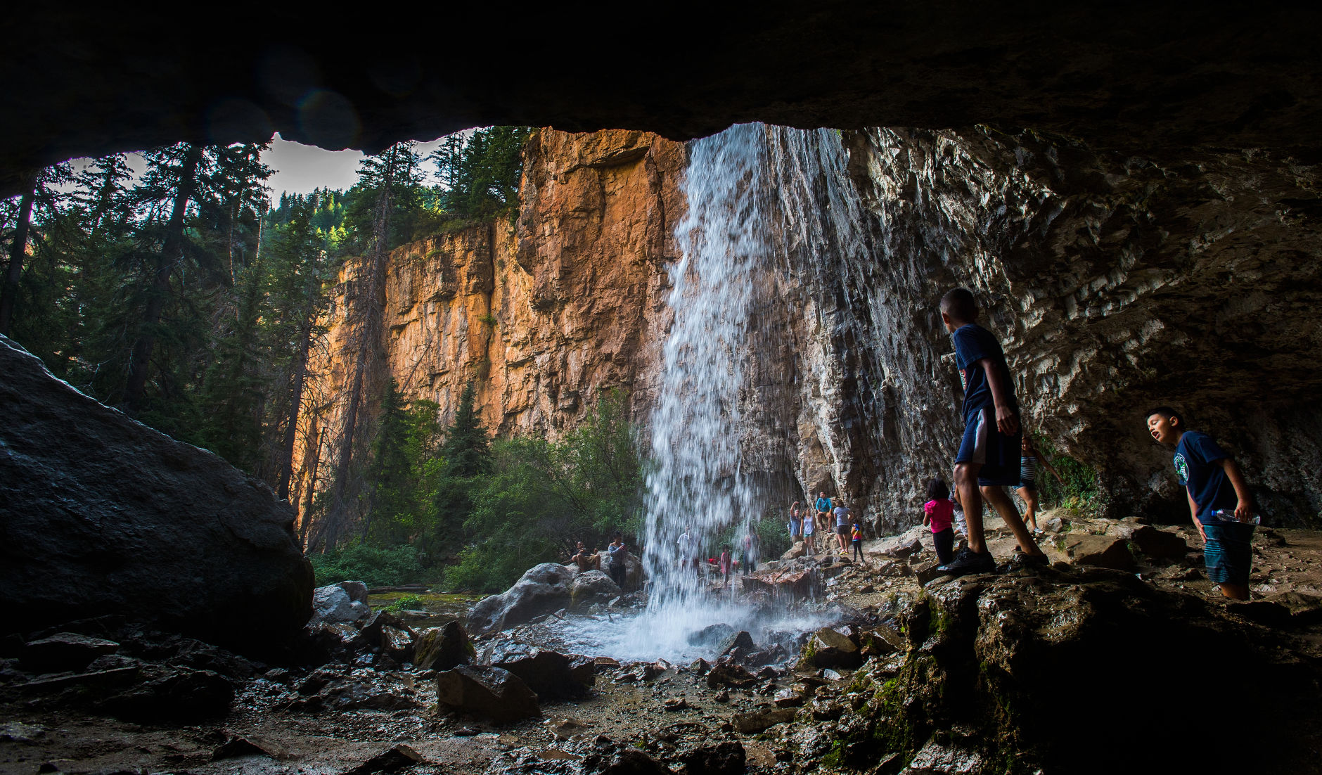 Hikers play in the falls at Spouting Rock above Hanging Lake in Glennwood Canyon, east of Glennwood Springs, Colo., Monday, Aug. 8, 2016. The popular trail to the lake and falls closes Saturday, Sept. 10 for trail repairs. (The Gazette, Christian Murdock) (CHRISTIAN MURDOCK, THE GAZETTE)