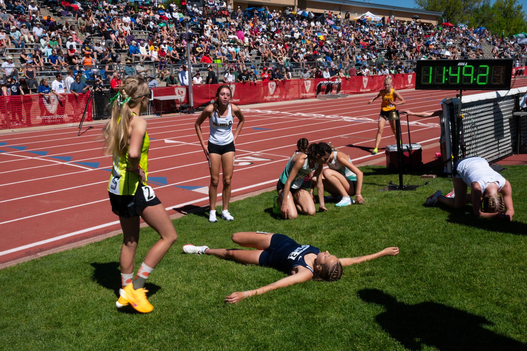 Runners at the finish line of a race at the Colorado High School Activities Association state track and field championships on Friday, May 17, 2024, at Jeffco Stadium in Lakewood, Colo. (Parker Seibold, The Gazette) (Parker Seibold)