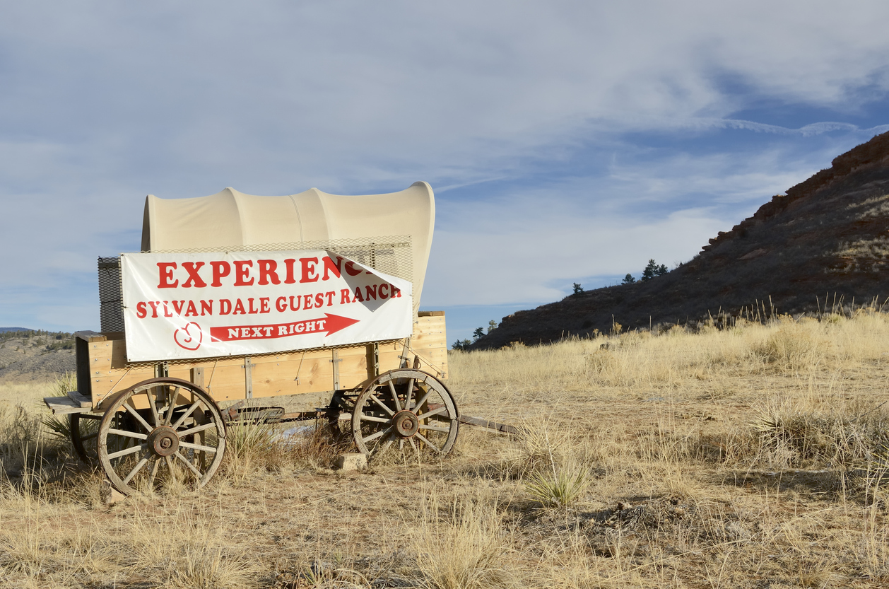 A sign for Sylvan Dale Guest Ranch. Photo Credit: RiverNorthPhotography (iStock). (RiverNorthPhotography)