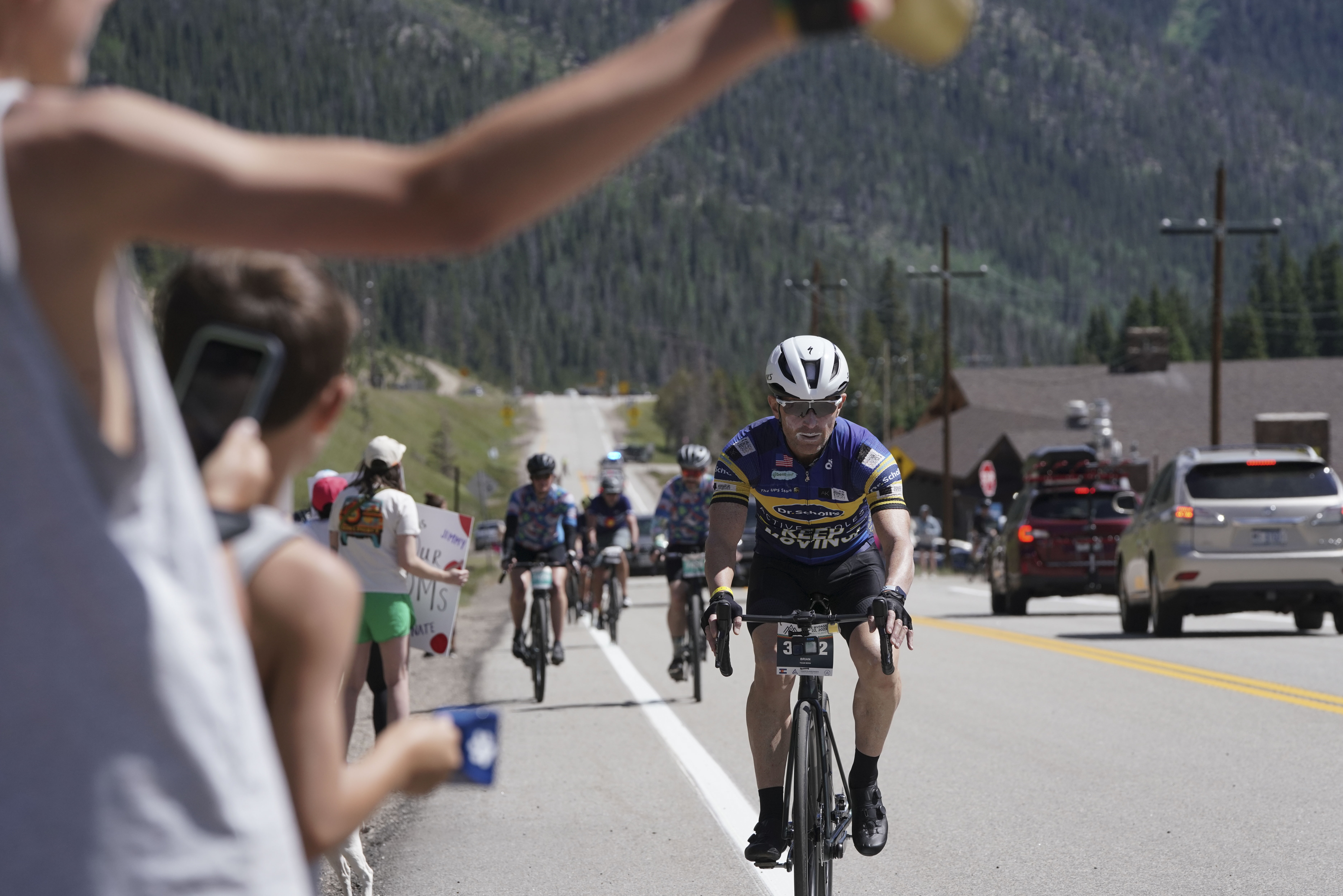 FILE PHOTO: Cyclists ride past people cheering as they approach Loveland Pass during the Triple Bypass in Colorado, Saturday, July, 22, 2023. The course takes cyclist through the mountains from Evergreen to Avon and is about 118 miles. The 2025 Triple Bypass is Saturday, meaning U.S. 6 is closed from 9 a.m. to 3 p.m. (Rebecca Slezak/Special to The Denver Gazette) (Rebecca Slezak/Denver Gazette)