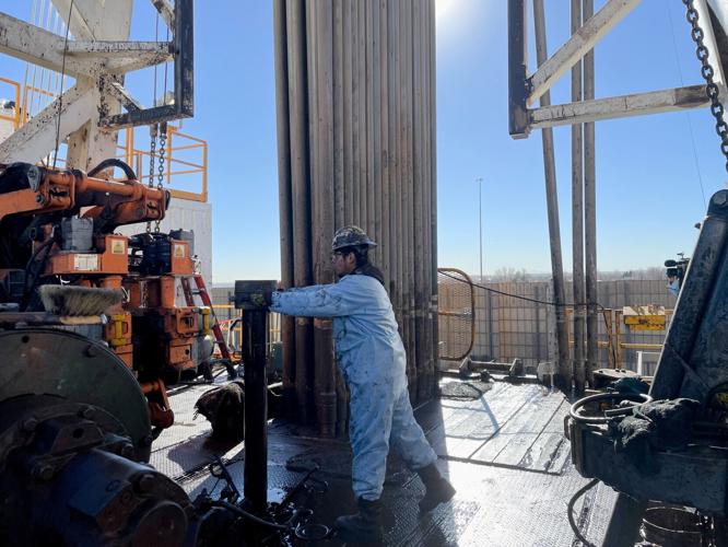 FILE PHOTO: A rig hand works on an electric drilling rig for oil producer Civitas Resources, at the Denver suburbs, in Broomfield (copy) (copy)
