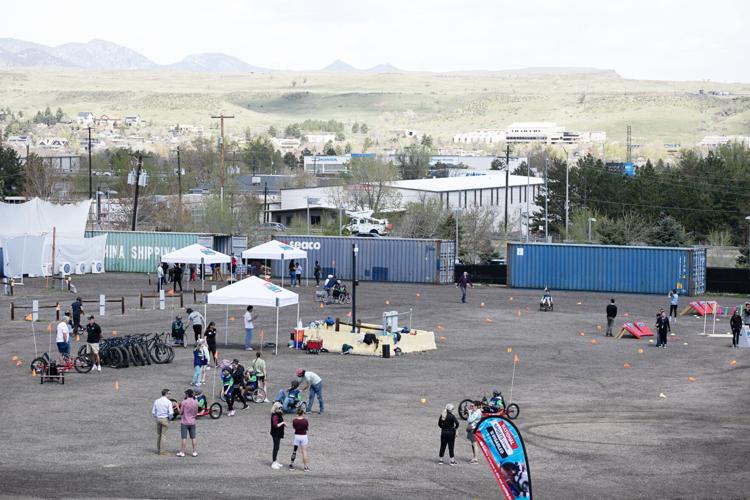 Students, parents and workers with the National Sports Center for the Disabled (NSCD) explore the adaptive sport opportunities