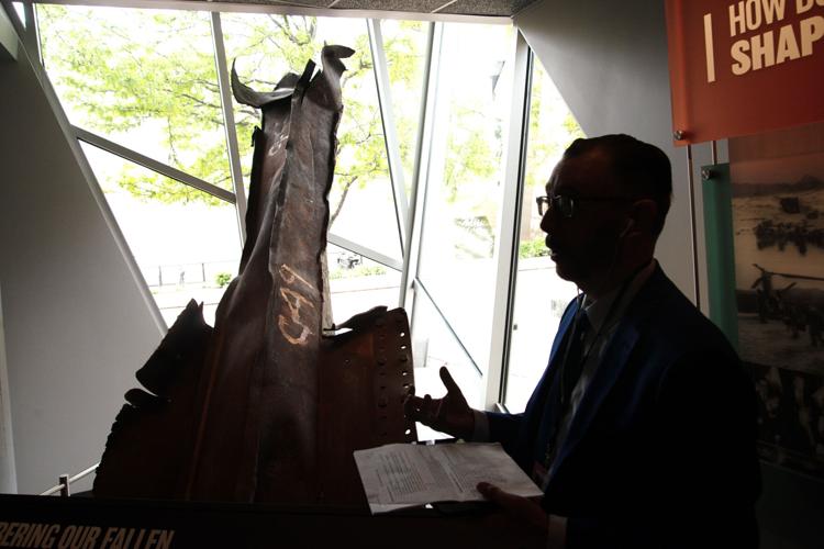 James Hippensteel, right, walks visitors through