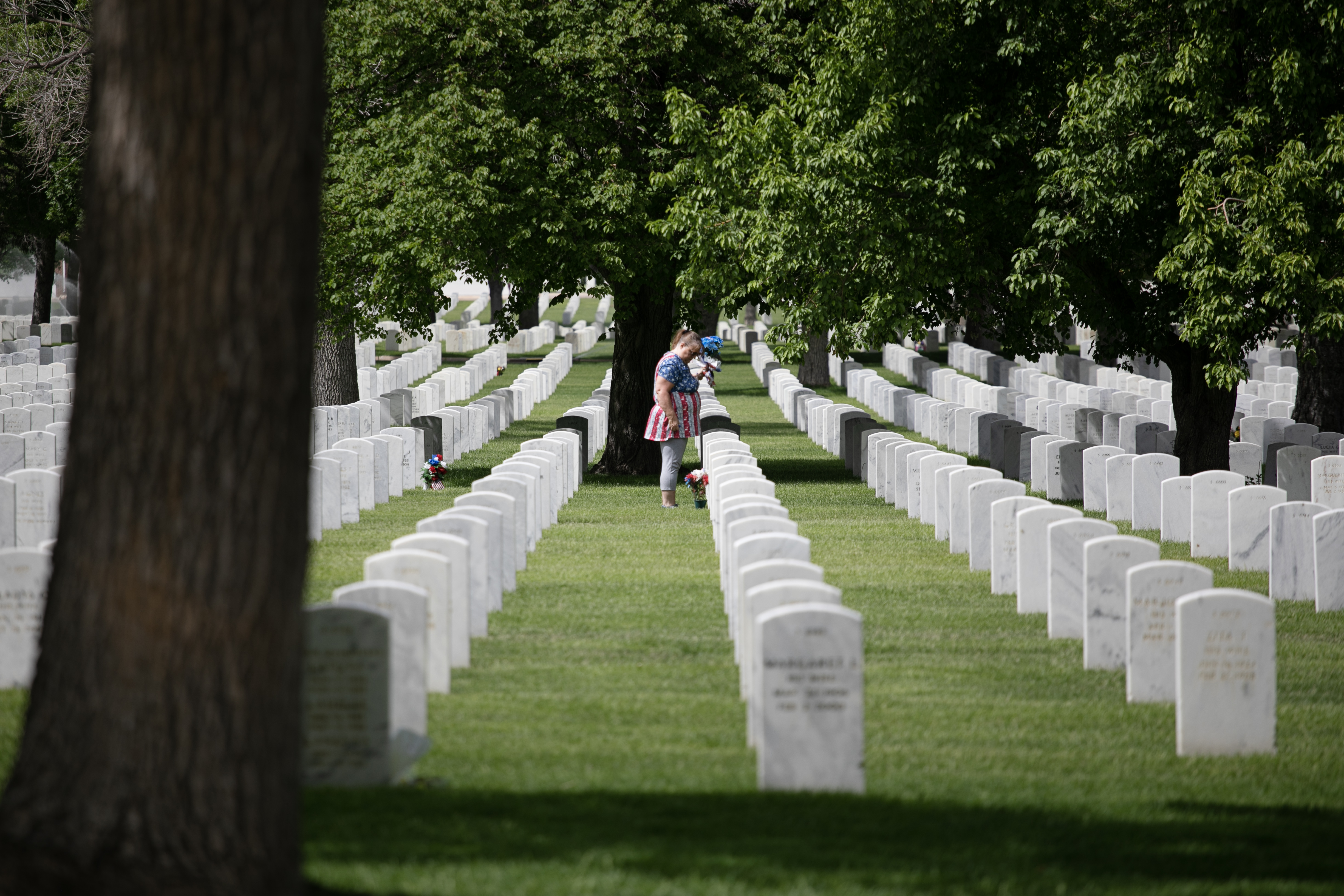 A visitor at Fort Logan National Cemetery pays their respects on Friday, May 24, 2024. (TomHellauerMultimedia Producertom.hellauer@denvergazette.comhttps://denvergazette.com/content/tncms/avatars/f/9e/622/f9e6228a-3b6b-11ed-bf10-fbb71fa8e421.f54b911252c540f1d61709edc4727a39.png)