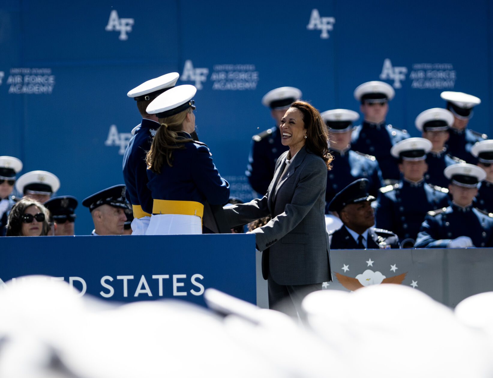 Vice President of the United States Kamala Harris accepts a gift from the class of 2024 at the United States Air Force Academy graduation at Falcon Stadium on Thursday, May 30, 2024, in Colorado Springs, Colo. (Parker Seibold, The Gazette) (Parker Seibold)