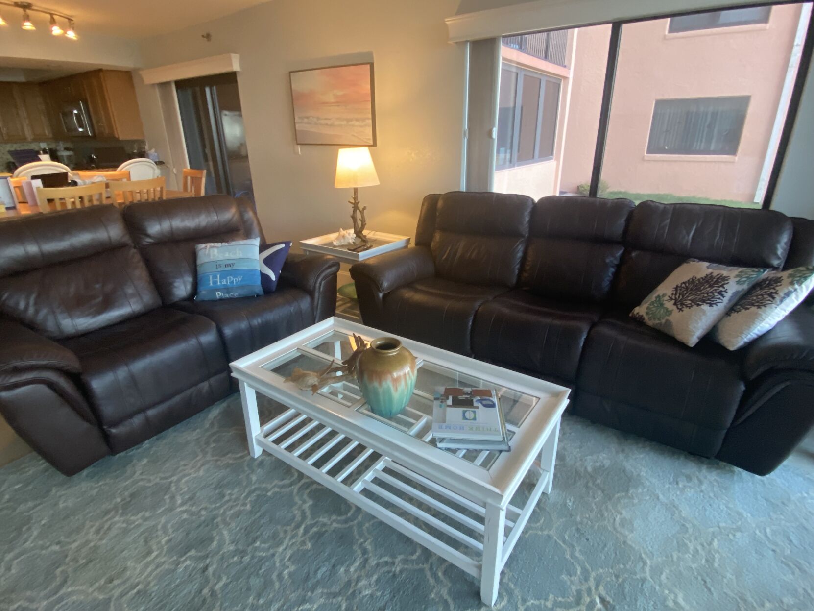 These workhorse faux leather sofas weren’t the right vibe for this beach condo but were perfect for a home with active kids and shedding dogs. The new sectional is a better fit, and, because it’s covered in performance fabric, will withstand abuse. Photos by Marni Jameson (Marni Jameson)