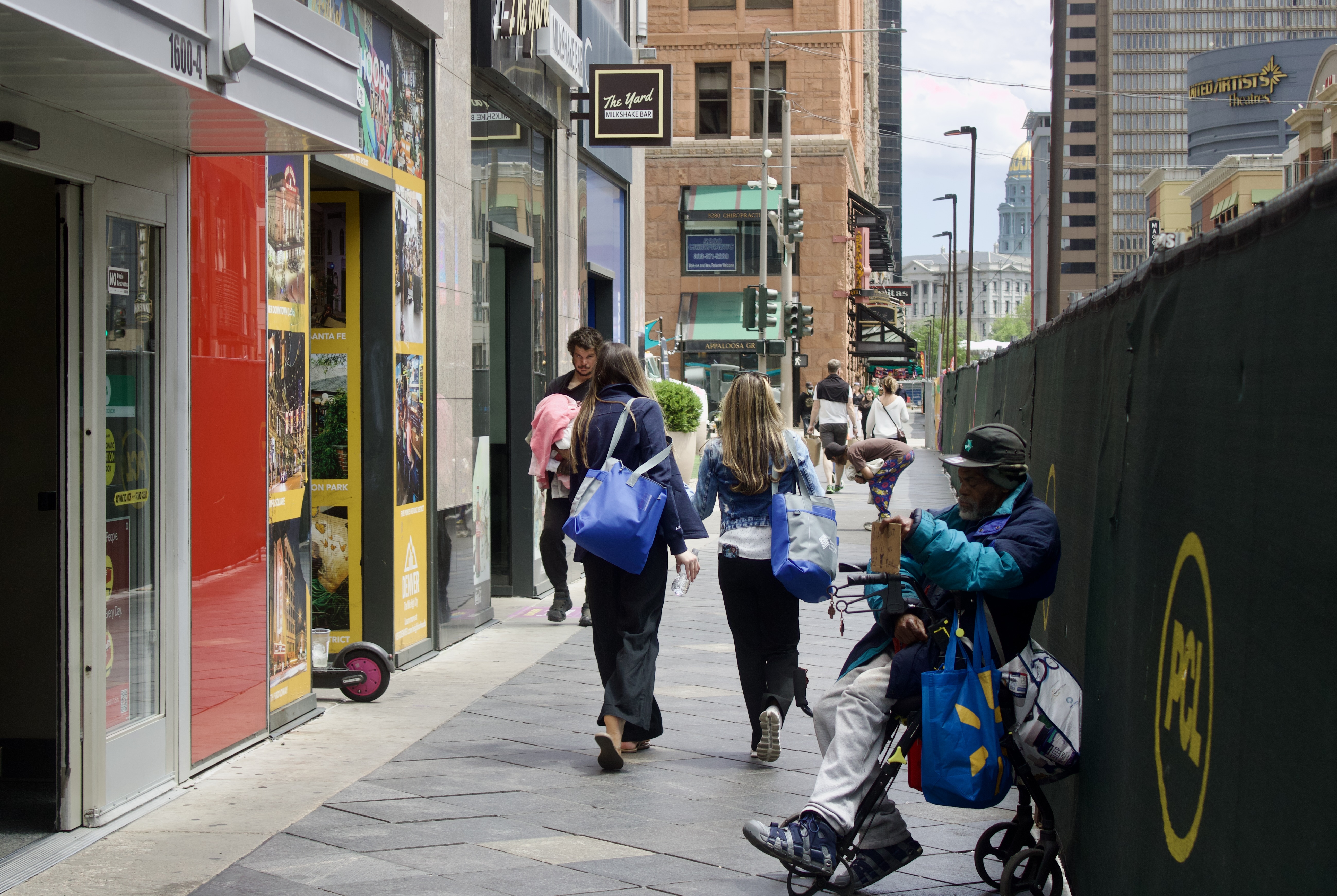 A homeless man sleeps with a sign asking for help, while in the background a man walks down the path carrying personal belongings and a man is hunched over in the middle of the walkway while pedestrians walk along 16th Street Mall under construction on Monday, May 20 in Denver, Colo. (NoahFestensteinCity Government Reporternoah.festenstein@denvergazette.comhttps://denvergazette.com/content/tncms/avatars/9/f0/326/9f032698-379f-11ee-8053-8bacbed4931f.60984dba383441d9647e0e740a08a8e6.png)