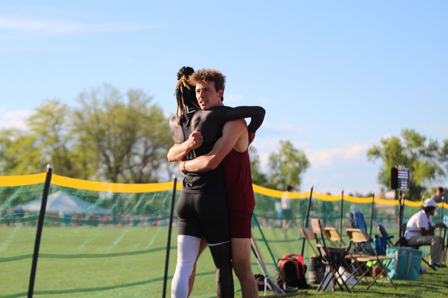 The Classical Academy’s Jordan Wenger (left) and Noah Osterloh embrace after finishing first and second in the 3A triple jump at the Colorado State Track and Field Championships at Jeffco Stadium on Thursday, May 16, 2024. (Marcus Hill, The Gazette) (marcus.hill@gazette.comhttps://secure.gravatar.com/avatar/0c9378738333374e5590886e4d4a0493?d=mm&r=g)