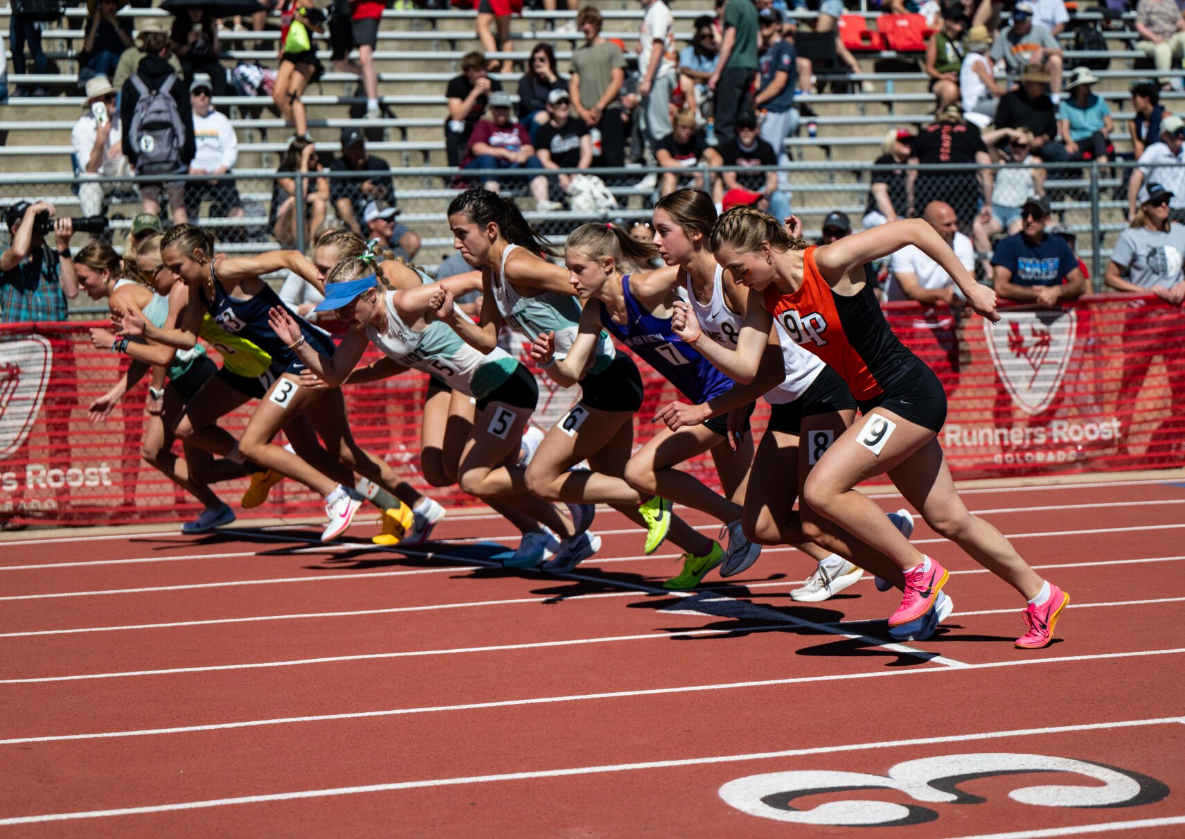Runners competing in the 4A girls 3200 take off from the starting line at the Colorado High School Activities Association state track and field championships on Friday, May 17, 2024, at Jeffco Stadium in Lakewood, Colo. (Parker Seibold, The Gazette) (Parker Seibold)