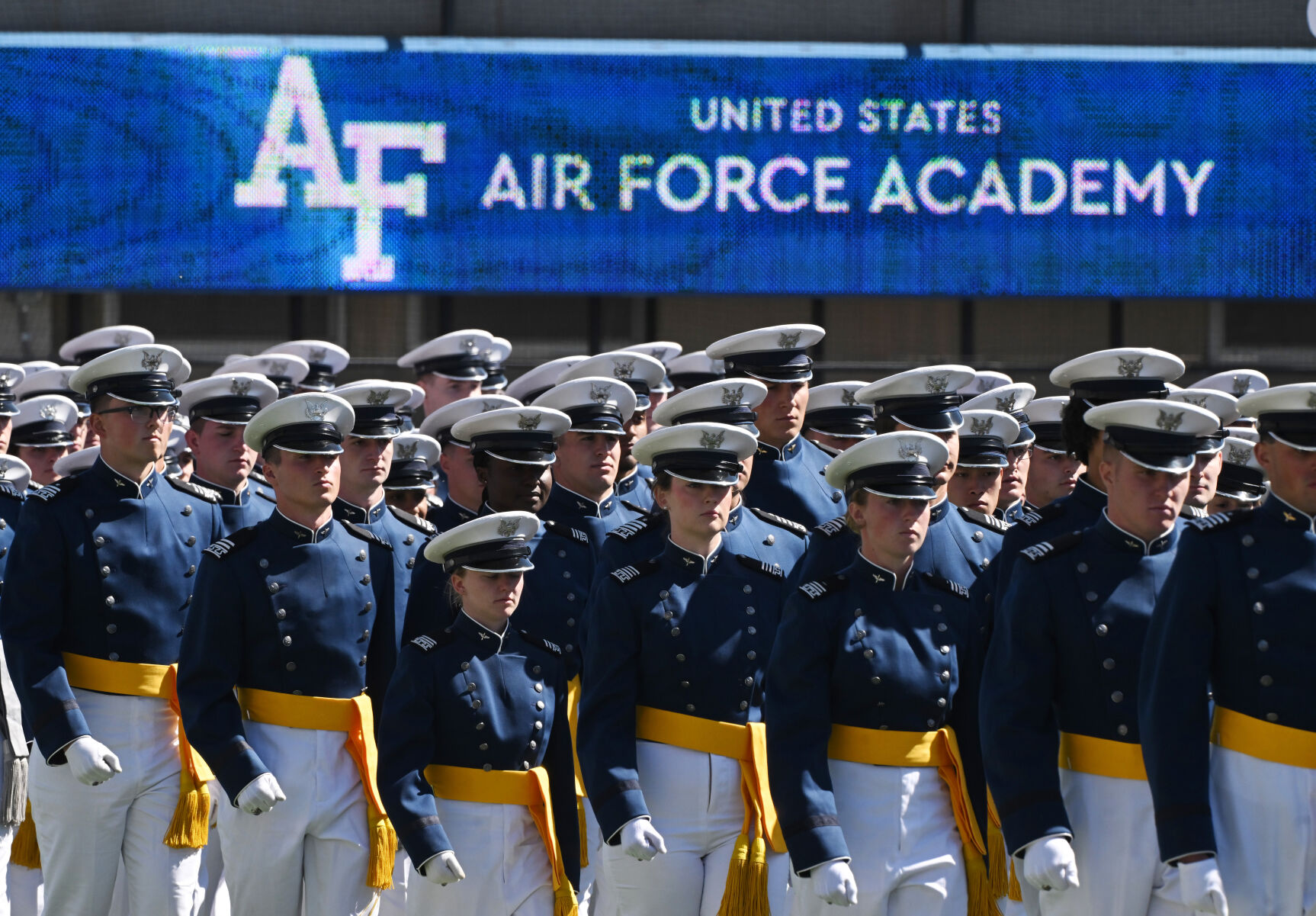 The class of 2024 of the United States Air Force Academy march to their seats during the beginning of graduation at Falcon Stadium on Thursday, May 30, 2024. (Photo by Jerilee Bennett, The Gazette)