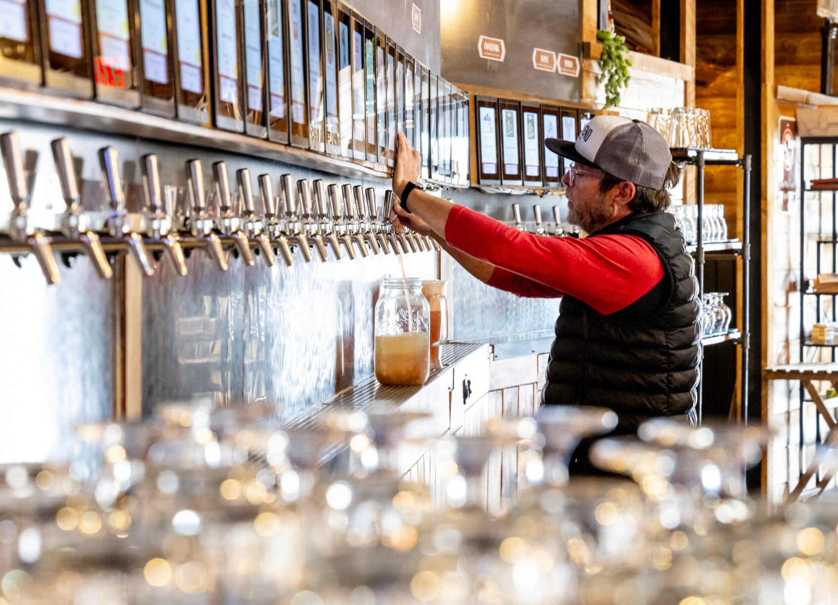 Shawn Finley, a Trails End Taproom employee, helps prepare the beer spouts Thursday before a soft opening of Barr Station. Trails End Taproom has teamed up with Felipe’s 109 to create the taproom and restaurant mashup, which celebrates its official grand opening Saturday in the former Mason Jar restaurant on Colorado Springs’ west side. (Parker Seibold, the gazette)