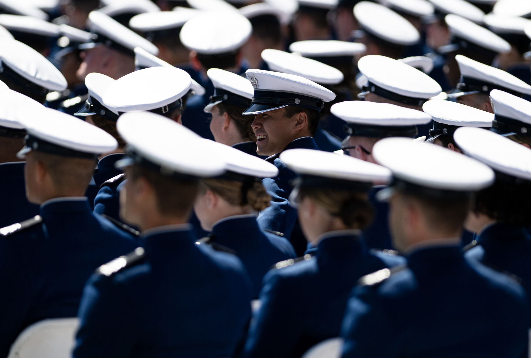 A United States Air Force Academy graduate smiles at the graduation ceremony at Falcon Stadium where 974 cadets became officers on Thursday, May 30, 2024, in Colorado Springs, Colo. (Parker Seibold, The Gazette) (Parker Seibold)