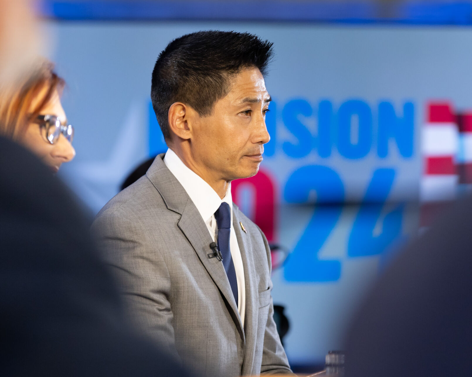 Candidate Peter Yu waits for a question during the May 30 debate. (Tom Green, 9News)