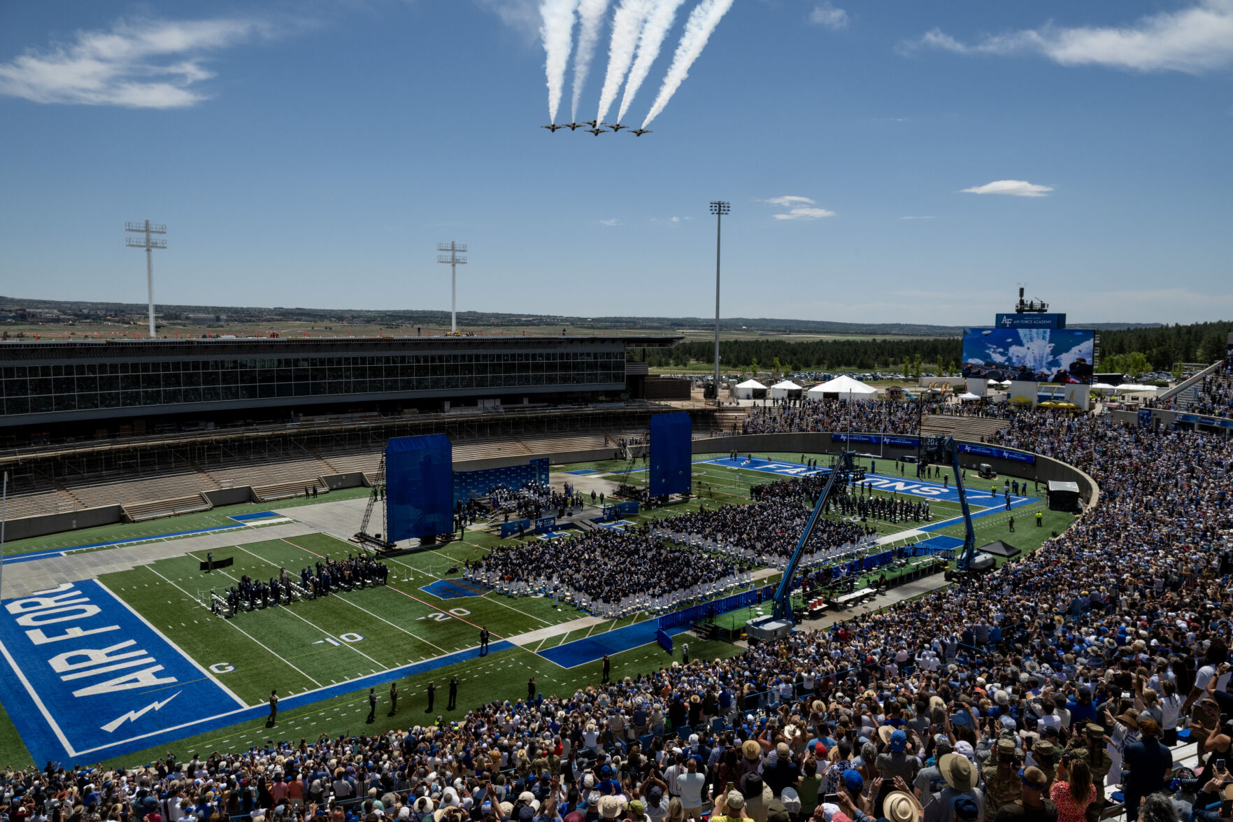 The United States Air Force Thunderbirds fly over the Air Force Academy graduation at Falcon Stadium where 974 cadets became officers on Thursday, May 30, 2024, in Colorado Springs, Colo. (Parker Seibold, The Gazette) (Parker Seibold)
