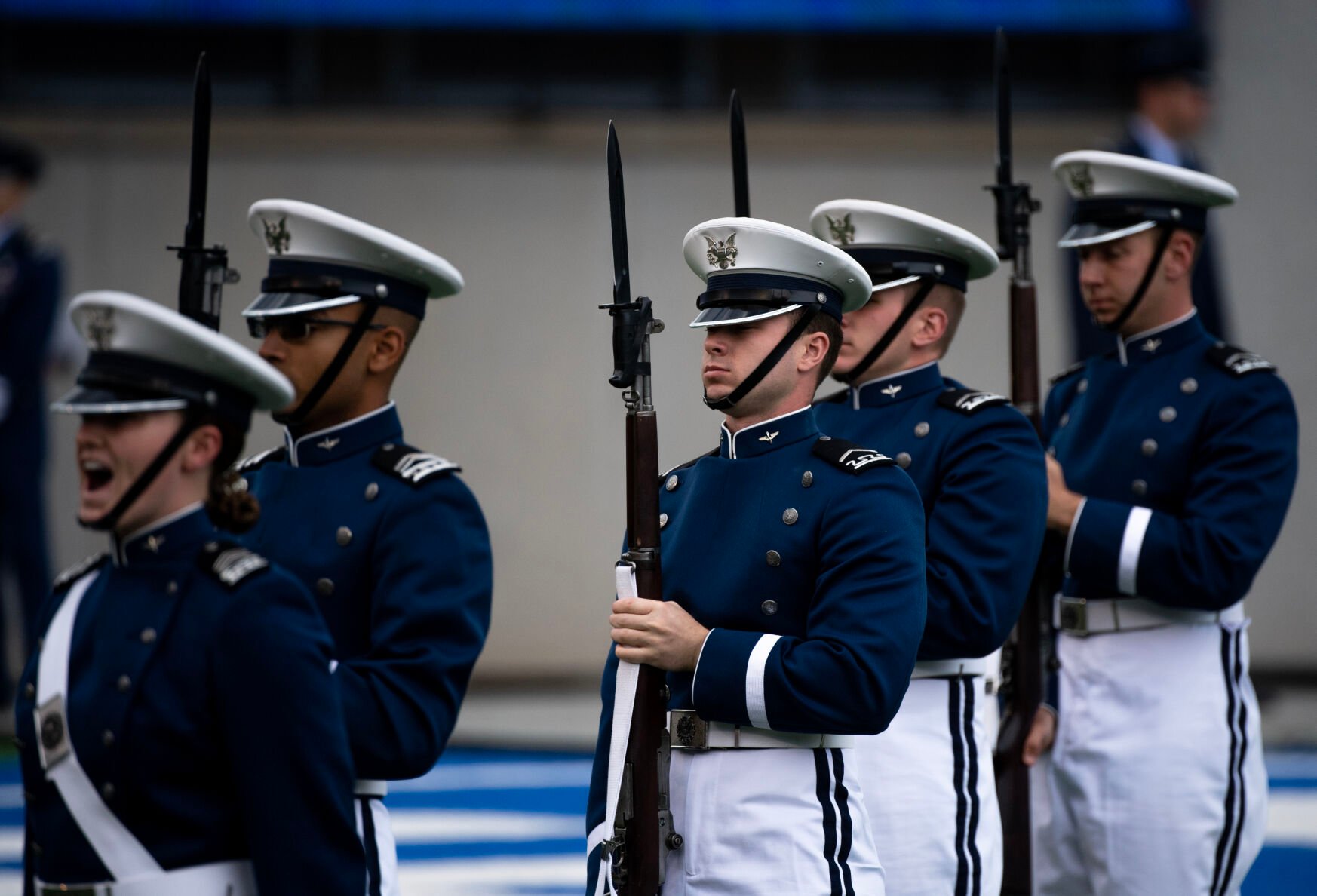 The cadet honor guard drill team performs before the Air Force Academy graduation ceremony at Falcon Stadium on Thursday, June 1, 2023. (Parker Seibold, The Gazette) (Parker Seibold)
