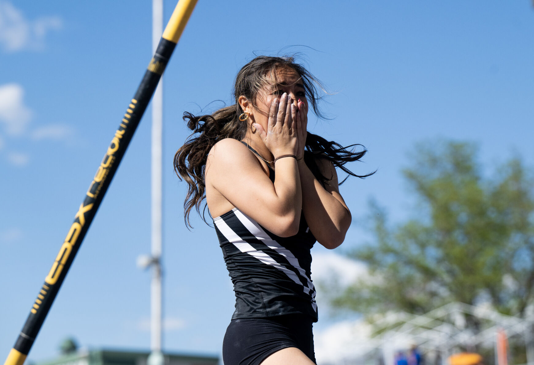 Peak to Peak’s Kourtney Rathke reacts after clearing the bar in the 3A girls pole vault at the Colorado High School Activities Association state track and field championships on Friday, May 17, 2024, at Jeffco Stadium in Lakewood, Colo. Rathke earned the state title and broke the 3A girls state record with a height of 13-10 alongside The Classical Academy’s Anna Willis. (Parker Seibold, The Gazette) (Parker Seibold)