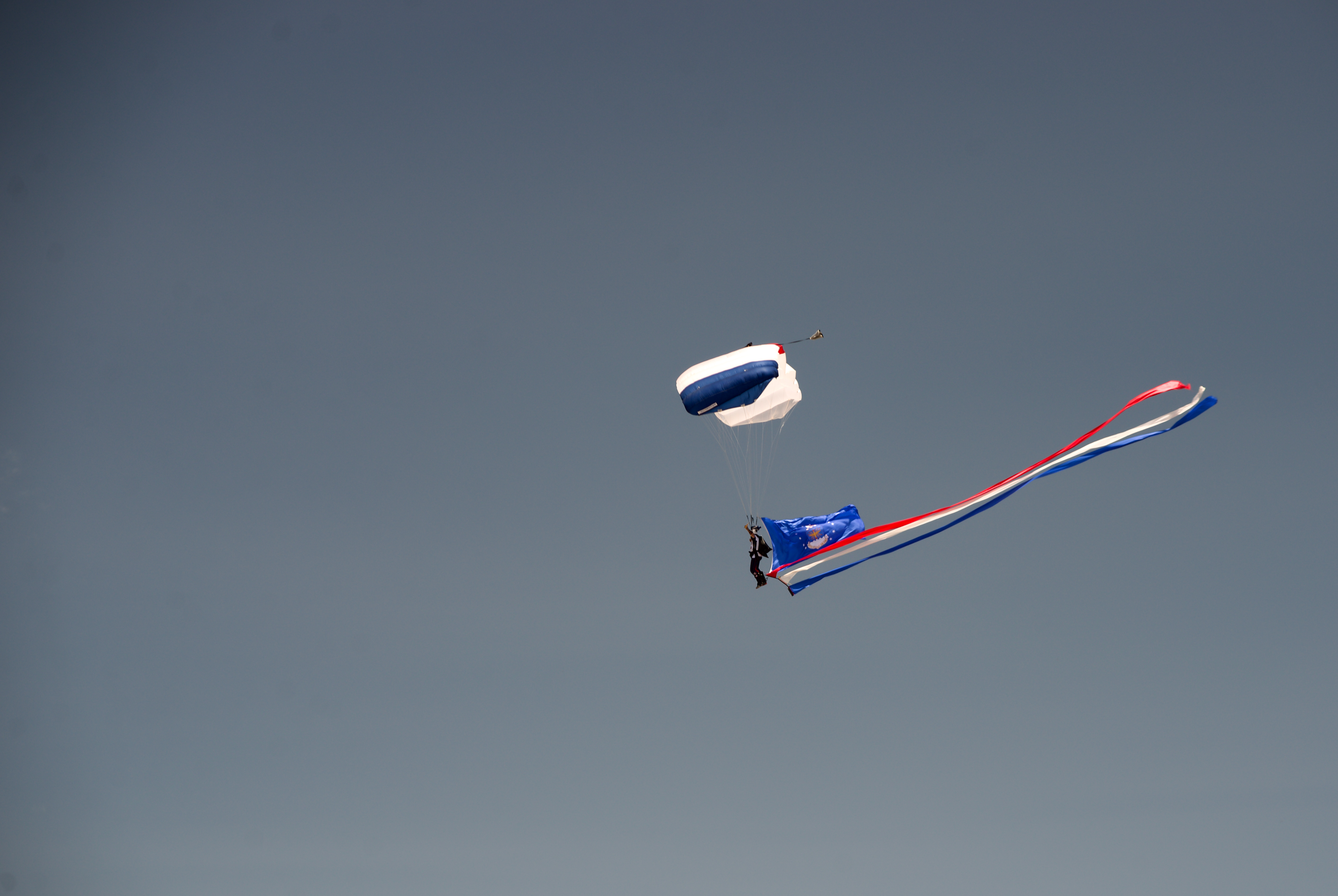 As part of Memorial Day celebrations in Boulder on May 27, 2024, a parachutist representing the United States Air Force leapt from an airplane carrying the services flag. All six branches of the United States military, Air Force, Army, Navy, Marine Corps, Coast Guard and Space Force, were represented. (Alex Edwards/The Denver Gazette) (AlexanderEdwardsBusiness Reporteralex.edwards@gazette.comhttps://secure.gravatar.com/avatar/dbaa50cc8a9183e280c297e3afa72ace?d=mm&r=g)