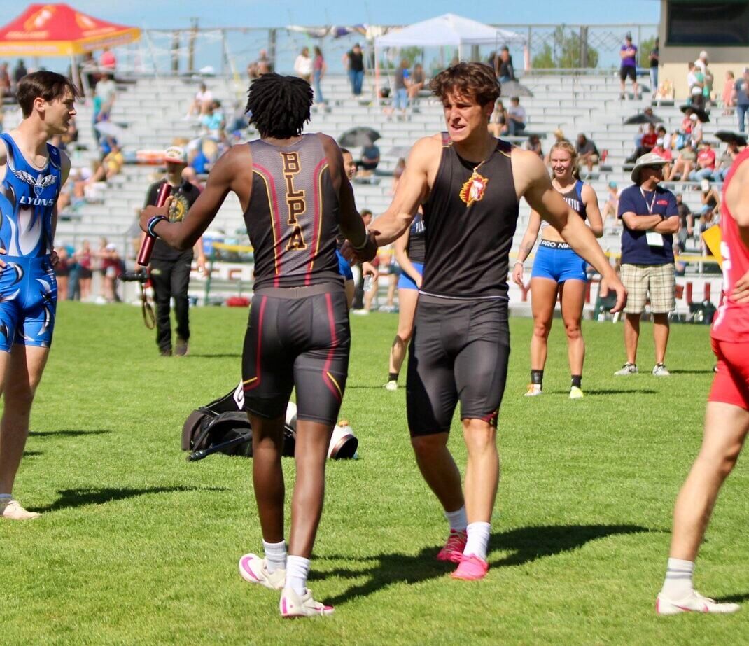 Member of the Banning Lewis boys 4x200 relay celebrate after their finish in the event at the Colorado State Track and Field Championships at Jeffco Stadium on Thursday, May 16, 2024. (Marcus Hill, The Gazette) (marcus.hill@gazette.comhttps://secure.gravatar.com/avatar/0c9378738333374e5590886e4d4a0493?d=mm&r=g)