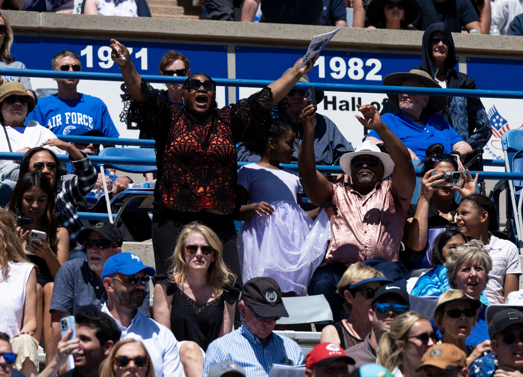 The family of a cadet cheers during the United States Air Force Academy graduation at Falcon Stadium on Thursday, May 30, 2024, in Colorado Springs, Colo. (Parker Seibold, The Gazette) (Parker Seibold)