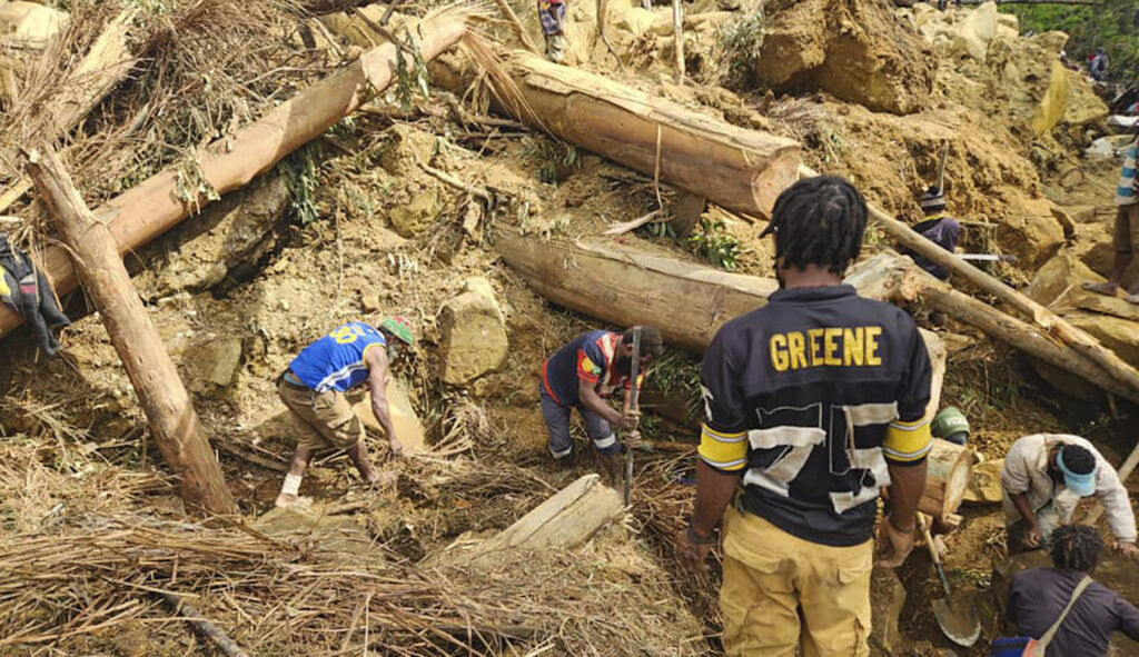 Hundreds dead and missing after Papua New Guinea landslide buries more than 2,000
