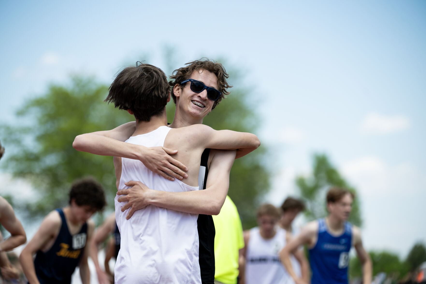 Peyton’s Matthew Peery Jr., left, hugs Banning Lewis’ Paul Leader after the finish of the 2A boys 800 at the Colorado High School Activities Association state track and field championships on Friday, May 17, 2024, at Jeffco Stadium in Lakewood, Colo.(Parker Seibold, The Gazette) (Parker Seibold)