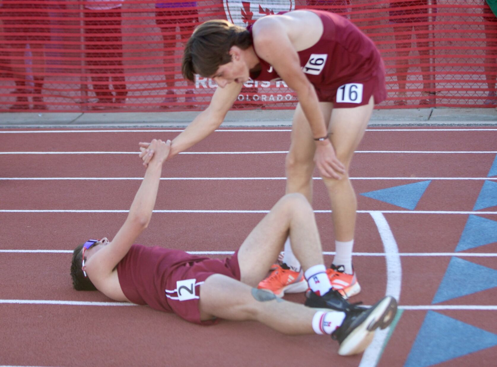 The Classical Academy's Matthew Edwards (left) and teammate Jackson Cook shake hands after completing the 3A boys 3,200-meter run at the Colorado State Track and Field Championships at Jeffco Stadium on Thursday, May 16, 2024. (Marcus Hill, The Gazette) (marcus.hill@gazette.comhttps://secure.gravatar.com/avatar/0c9378738333374e5590886e4d4a0493?d=mm&r=g)
