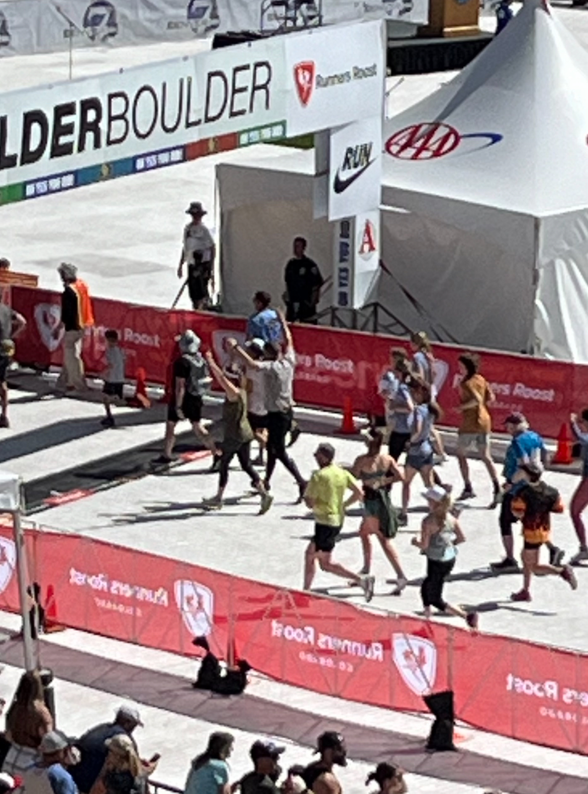 Runners finish the 44th BOLDERBoulder in Folsom Field at the University of Colorado Boulder on Monday, May 27, 2024. (Jim Trotter/Denver Gazette)