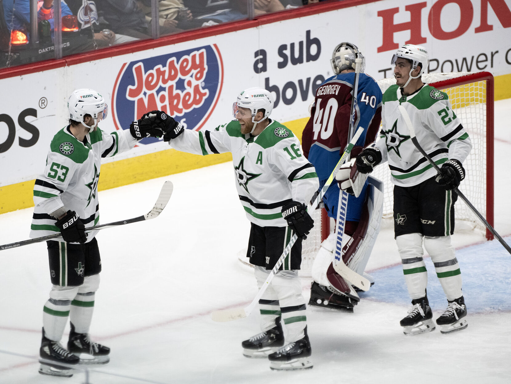 Dallas Stars center Wyatt Johnston (53) and Dallas Stars center Joe Pavelski (16) celebrate Johnston’s goal against Colorado Avalanche goaltender Alexandar Georgiev (40) during the second period of Game 4 of an NHL Stanley Cup second-round playoff series Monday, May 13, 2024, at Ball Arena in Denver. (The Gazette, Christian Murdock) (Christian Murdock/The Gazette)