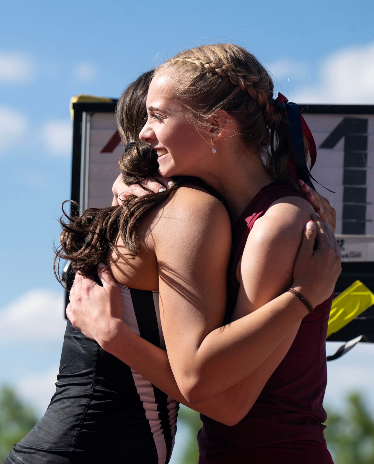 The Classical Academy’s Anna Willis, right, hugs Peak to Peak’s Kourtney Rathke competes after the completion of the 3A girls pole vault at the Colorado High School Activities Association state track and field championships on Friday, May 17, 2024, at Jeffco Stadium in Lakewood, Colo. (Parker Seibold, The Gazette) (Parker Seibold)
