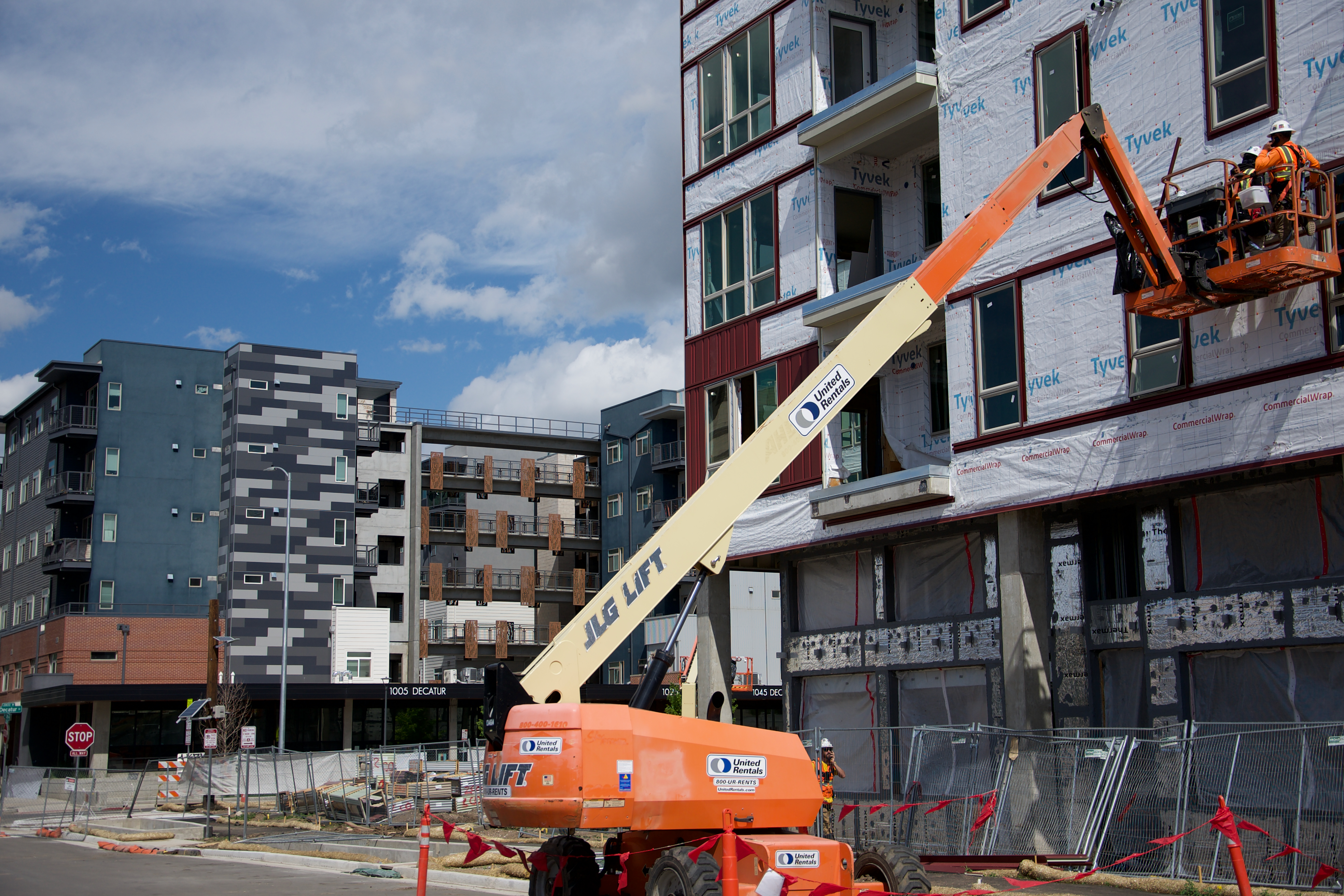 One building, in the background, stands completed while another continues to be built at Denver's Sun Valley on May 21, 2024. (Alex Edwards/The Denver Gazette) (AlexanderEdwardsBusiness Reporteralex.edwards@gazette.comhttps://secure.gravatar.com/avatar/dbaa50cc8a9183e280c297e3afa72ace?d=mm&r=g)