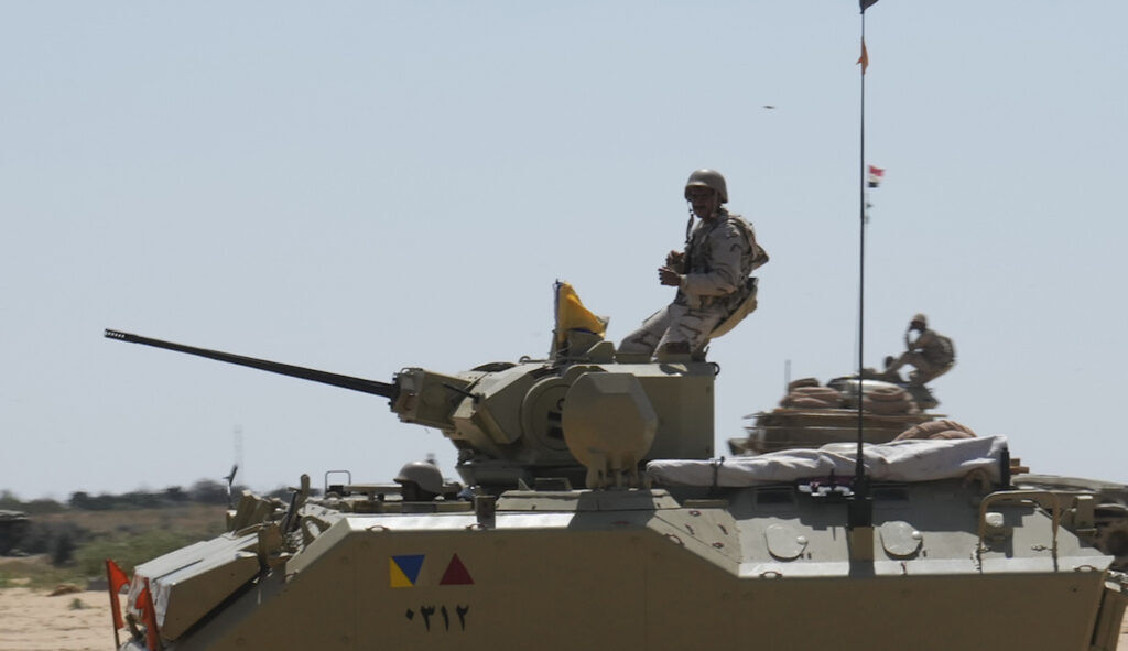 Israeli and Egyptian troops exchange gunfire at Rafah border crossing