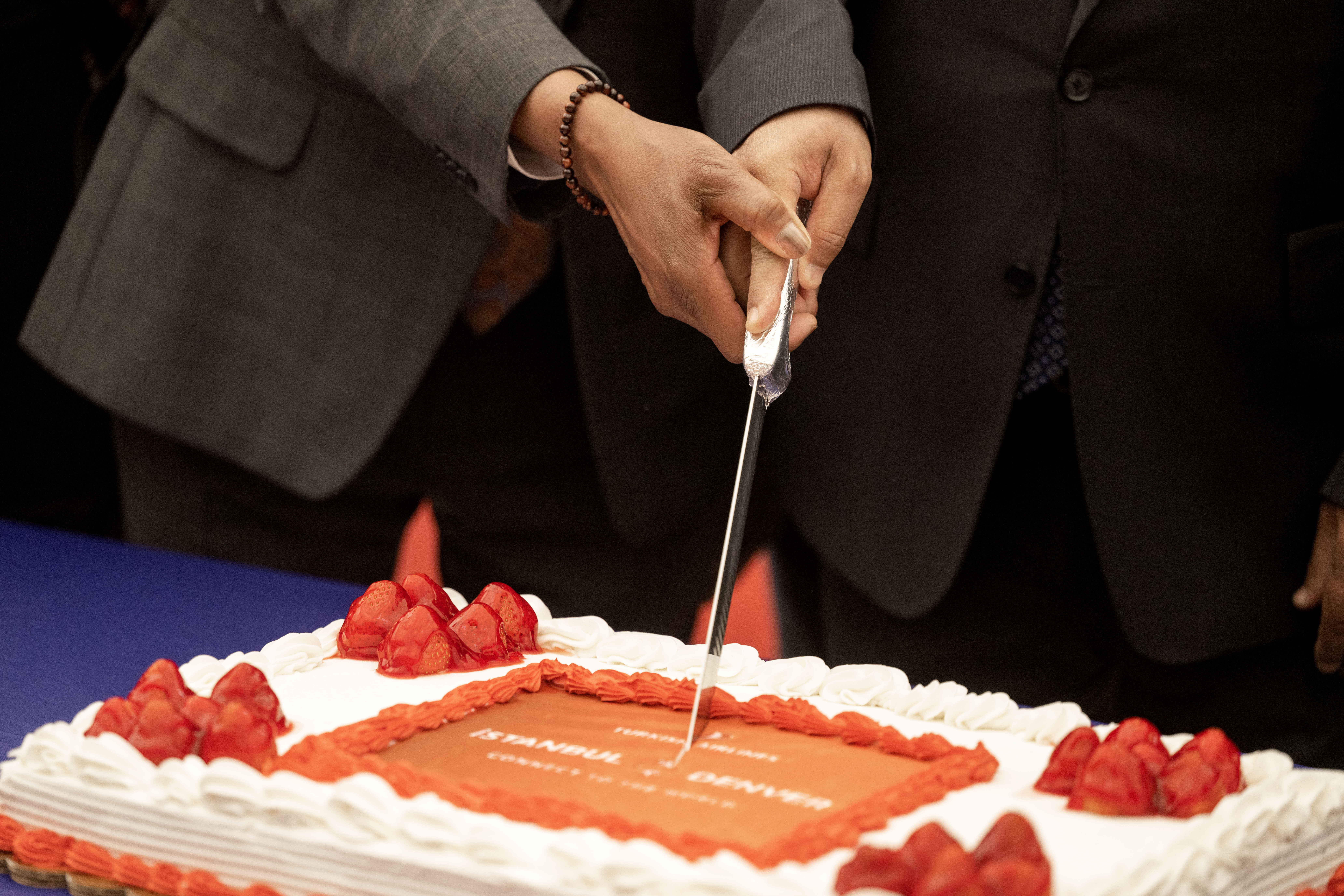 Phillip Washington, CEO of Denver International Airport, left, and Ahmet Bolt, Chairman of Turkish Airways, cut a cake celebrating the first non-stop flight from Istanbul to DIA on Tuesday, June 11, 2024. The flight is the longest direct route from DIA. (Stephen Swofford, Denver Gazette) (StephenSwoffordPhotographerstephen.swofford@gazette.comhttps://secure.gravatar.com/avatar/1ddcaf11c5d70eaa58546ddc4e038687?d=mm&r=g)