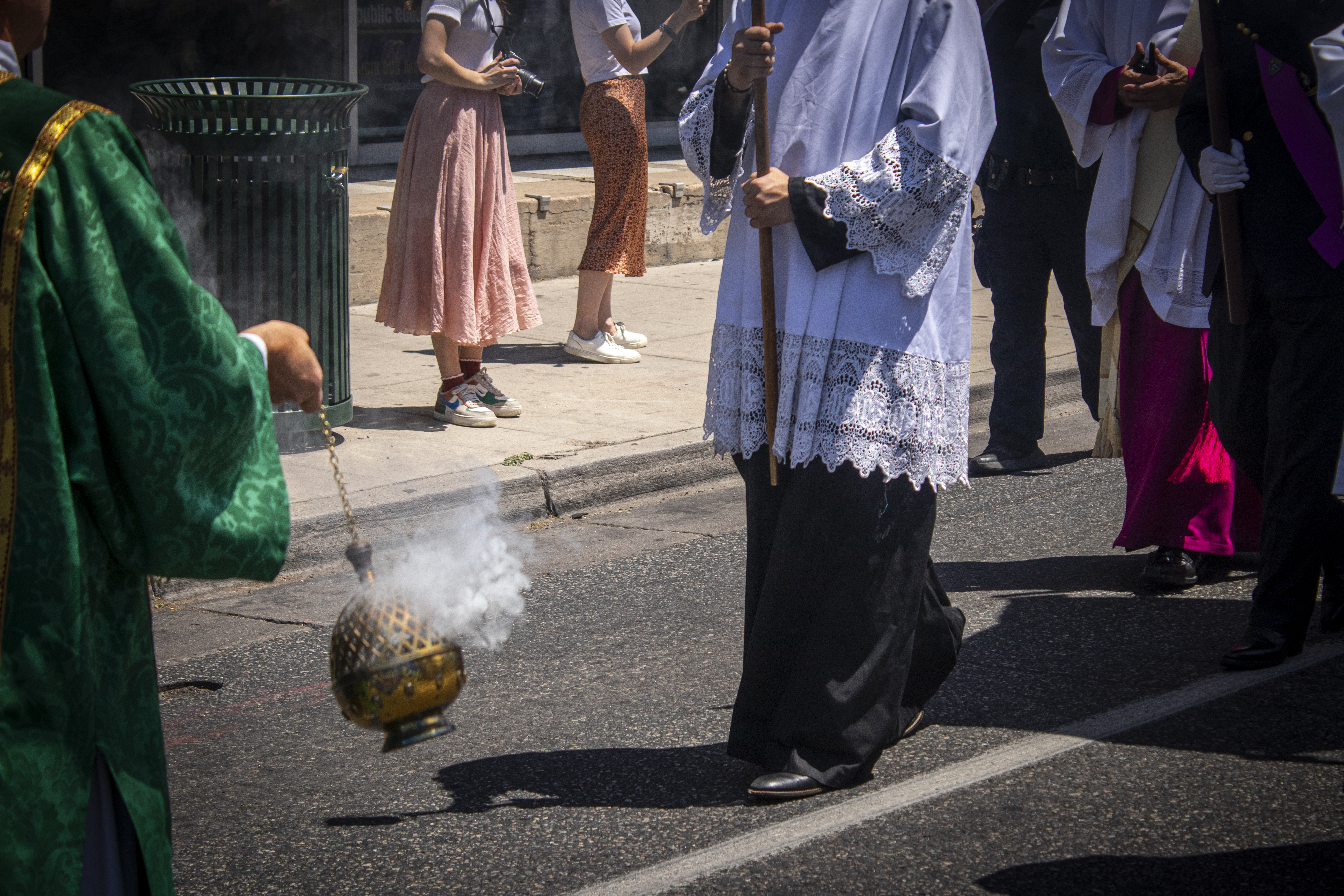 Incense smoke comes out of thurible during a Eucharistic procession along Colfax Avenue in downtown Denver on Sunday, June 9, 2024. (Bernadette Berdychowski / Denver Gazette)