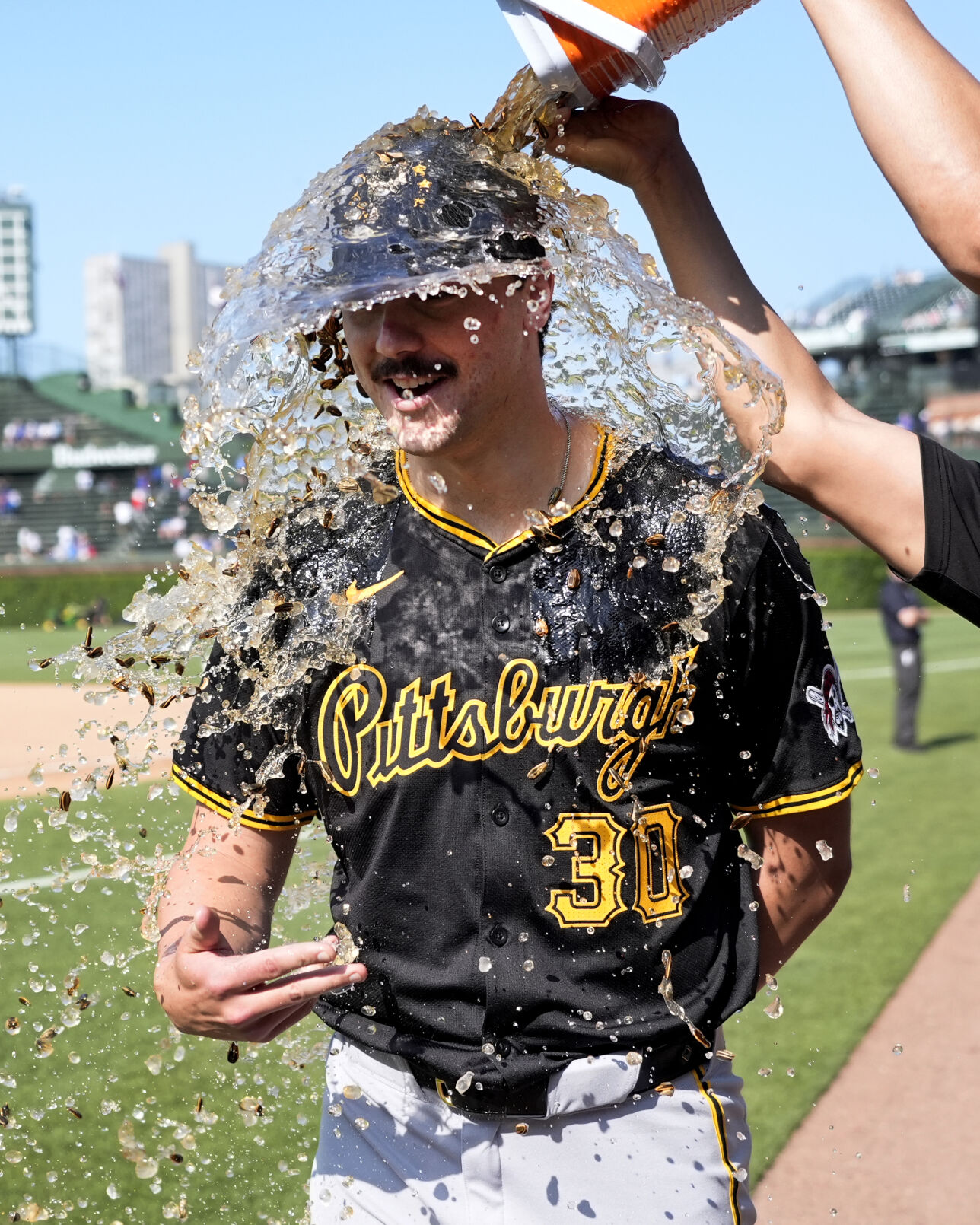 Pittsburgh Pirates starting pitcher Paul Skenes is doused with water after his performance against the Chicago Cubs on May 17 in Chicago. (the associated press)