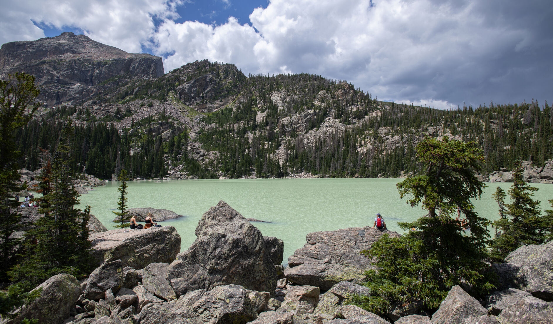 Hikers explore Lake Haiyaha Wednesday, July 27, 2022, in Rocky Mountain National Park in Colorado. (The Gazette, Christian Murdock) (Christian Murdock/The Gazette)