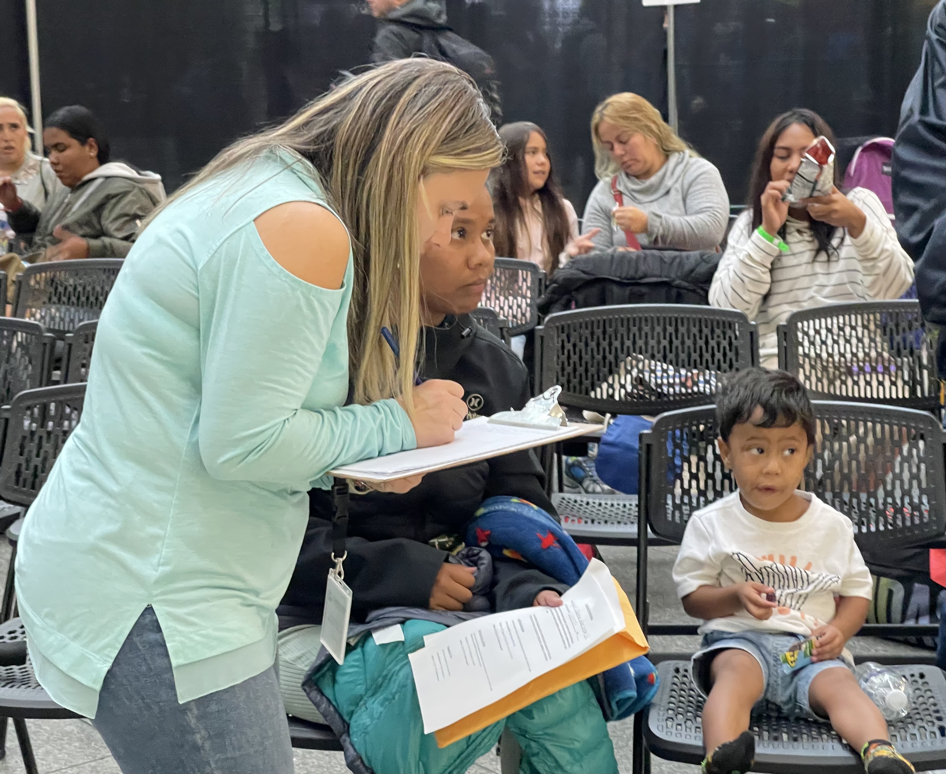 FILE PHOTO: A Venezuelan woman and her 2-year-old son check in with a Spanish-speaking volunteer at Denver’s immigrant reception center on Thursday, May 11, 2023. (NicoBrambilanico.brambila@denvergazette.comhttps://denvergazette.com/content/tncms/avatars/4/ec/74a/4ec74aa2-71b0-11ed-af6f-0f0ae7acf7b0.d52fca74e95503d77da50127c9ff4e2d.png)